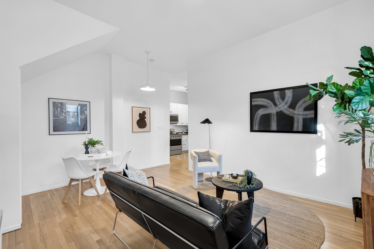 420 6th Avenue, Unit 11 Brooklyn, NY 11215 - Photo 2 of 12 a living room with furniture and a flat screen tv