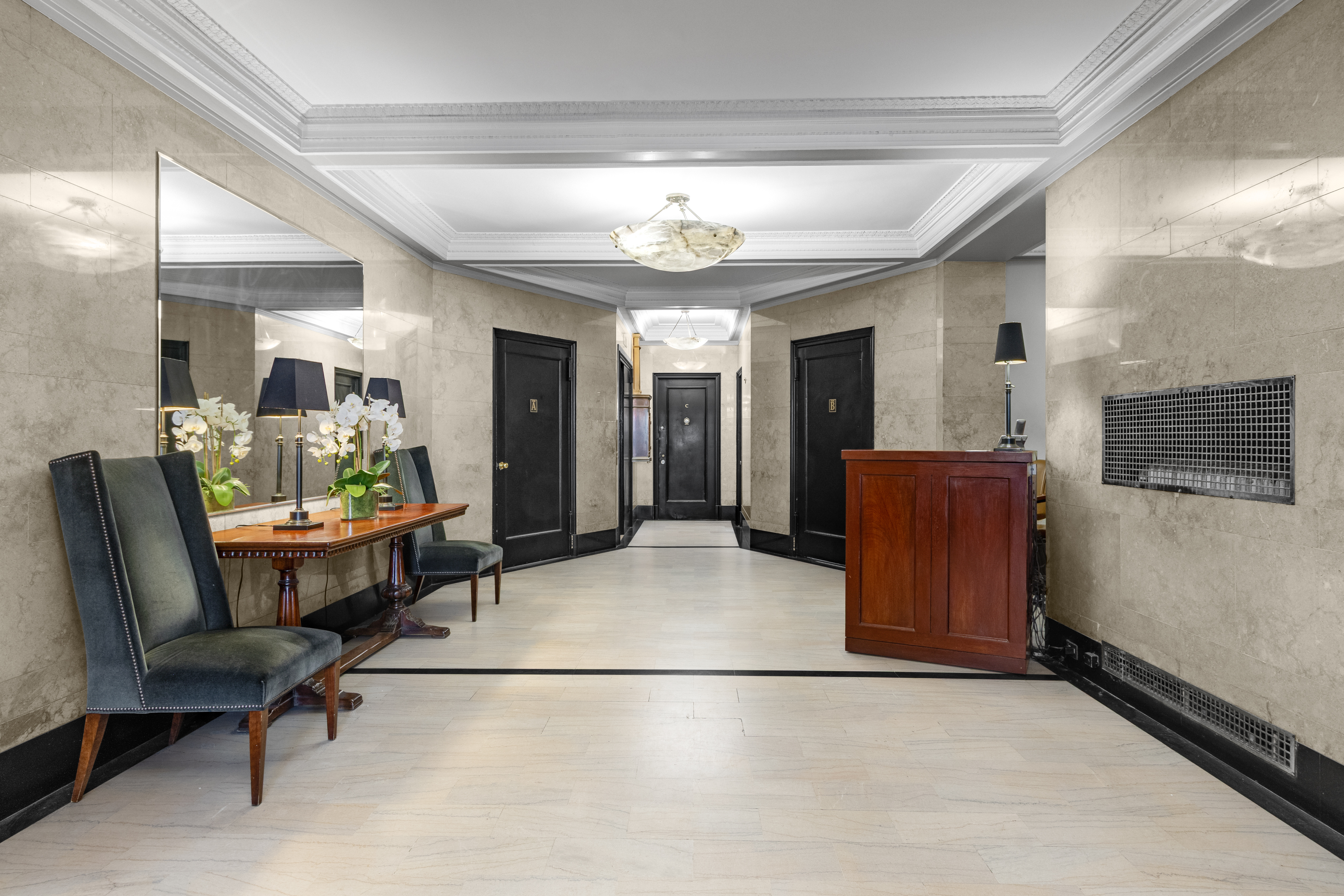 588 West End Avenue, Unit 16D Manhattan, NY 10024 - Photo 9 of 12 a view of a livingroom with furniture and a chandelier