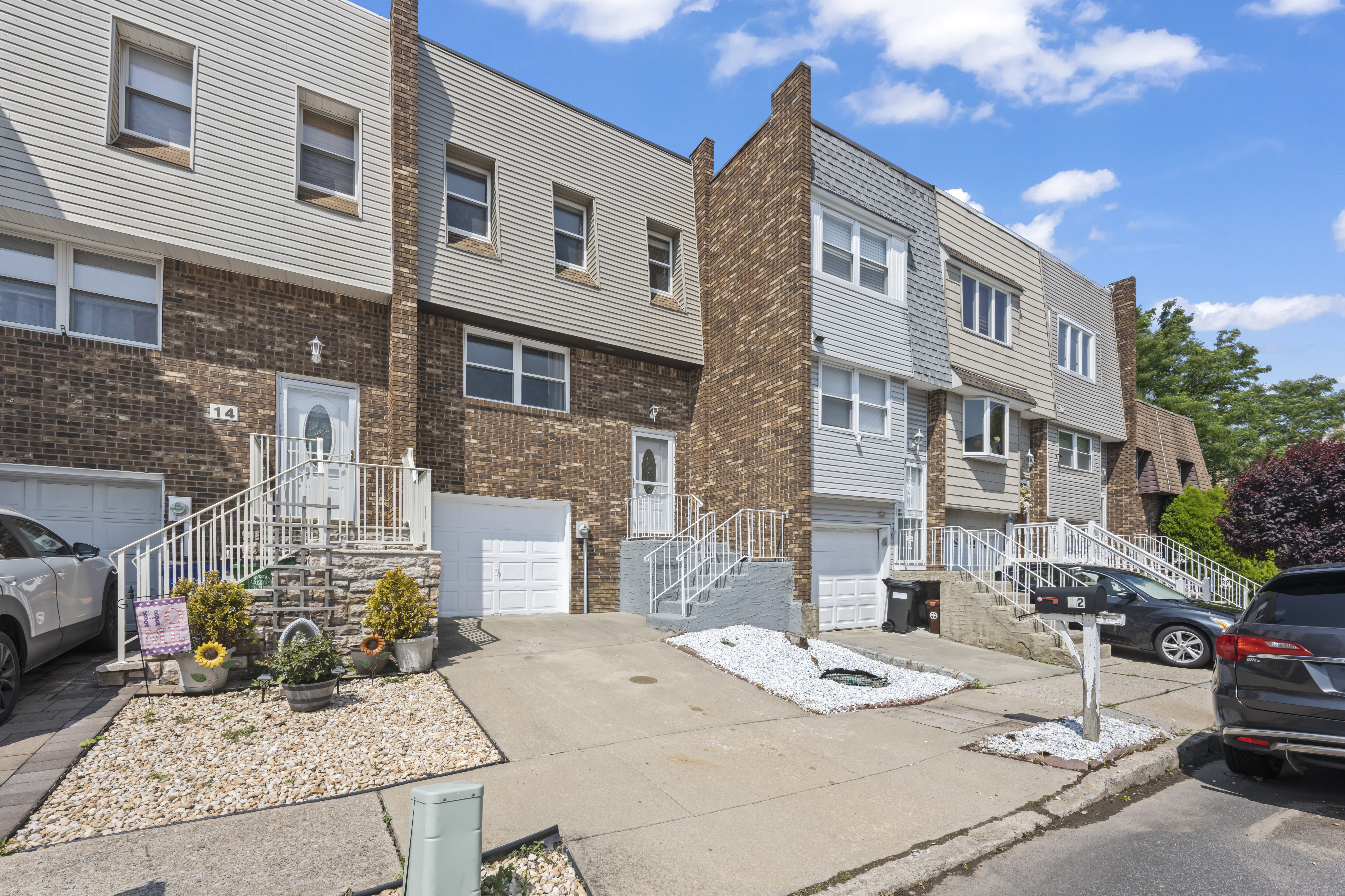 12 Yucca Drive Staten Island, NY 10312 - Photo 2 of 21 a view of a brick building next to a yard