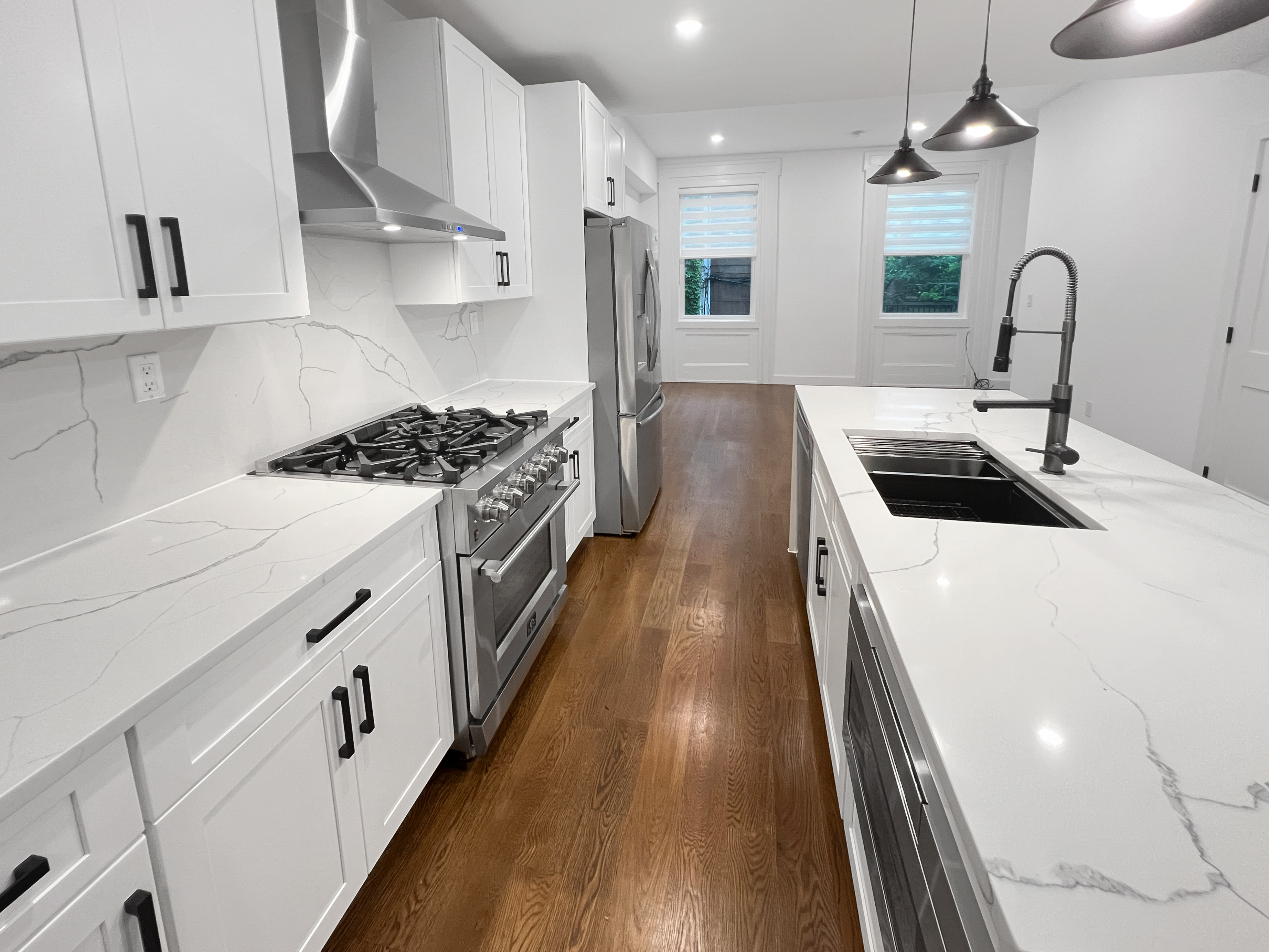 352 Degraw Street, Unit 1 Brooklyn, NY 11231 - Photo 5 of 20 a kitchen with sink a stove and refrigerator