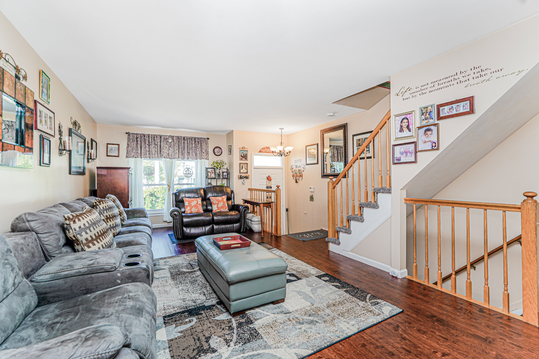 287 Greaves Avenue Staten Island, NY 10308 - Photo 4 of 35 a living room with furniture and wooden floor