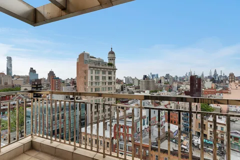 a view of balcony with furniture