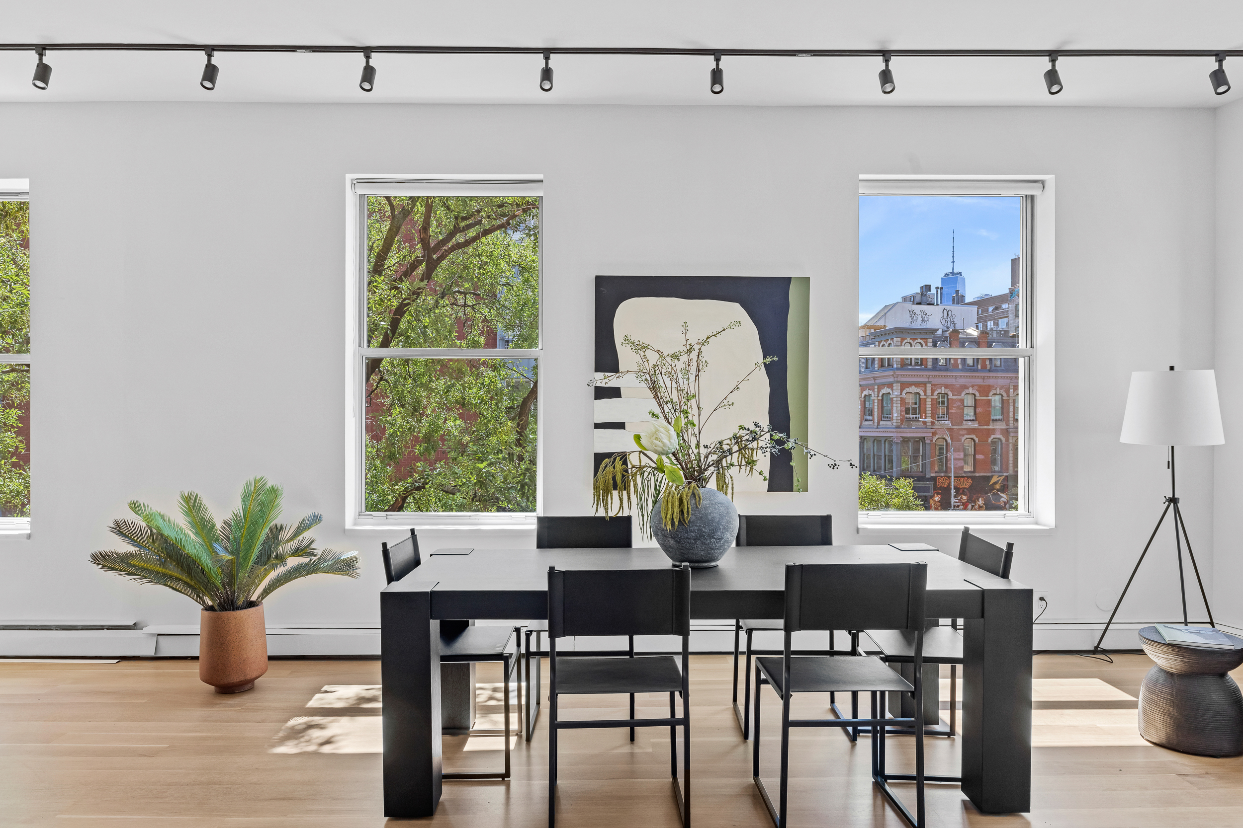 325 Bowery, Unit 3 Manhattan, NY 10003 - Photo 3 of 14 a view of a dining room with furniture window and wooden floor