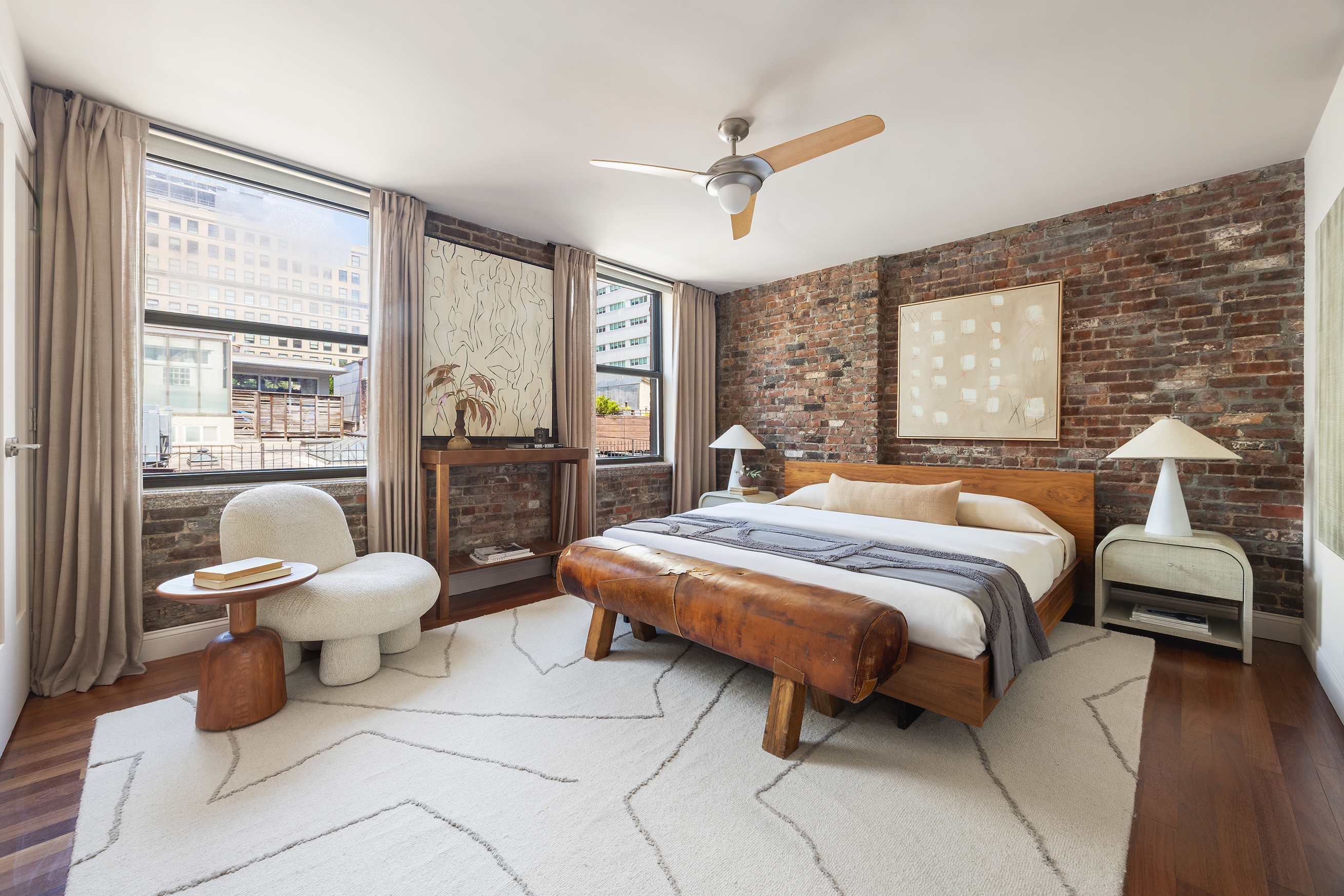 100 Reade Street, Unit 6CD Manhattan, NY 10013 - Photo 13 of 26 a bedroom with a bed and glass walk in closet