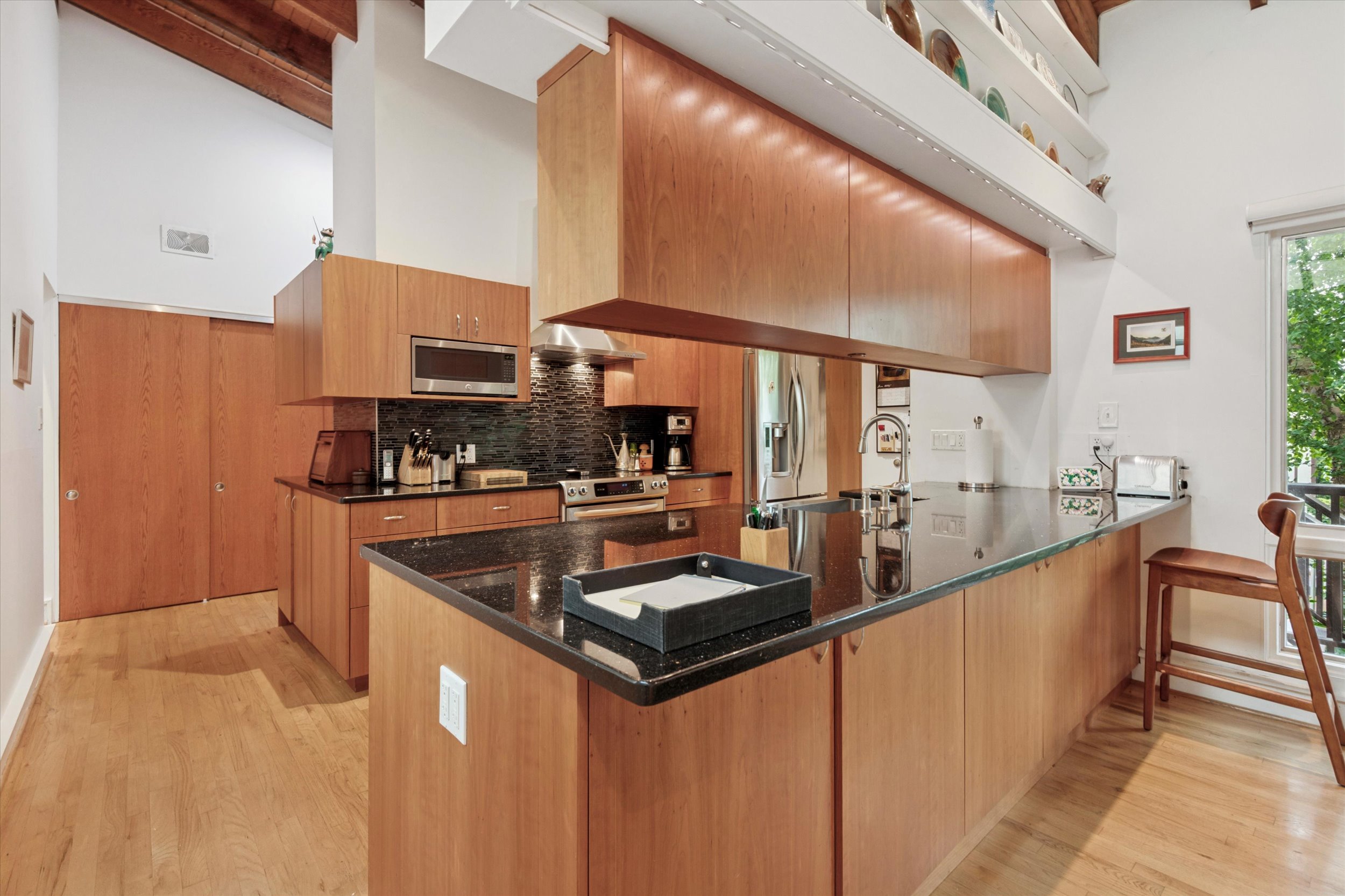 376 Merion Road Merion Station, PA 19066 - Photo 4 of 35 a kitchen with stainless steel appliances granite countertop a sink and a refrigerator