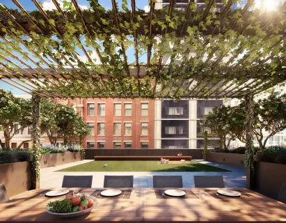 a swimming pool with outdoor seating and yard