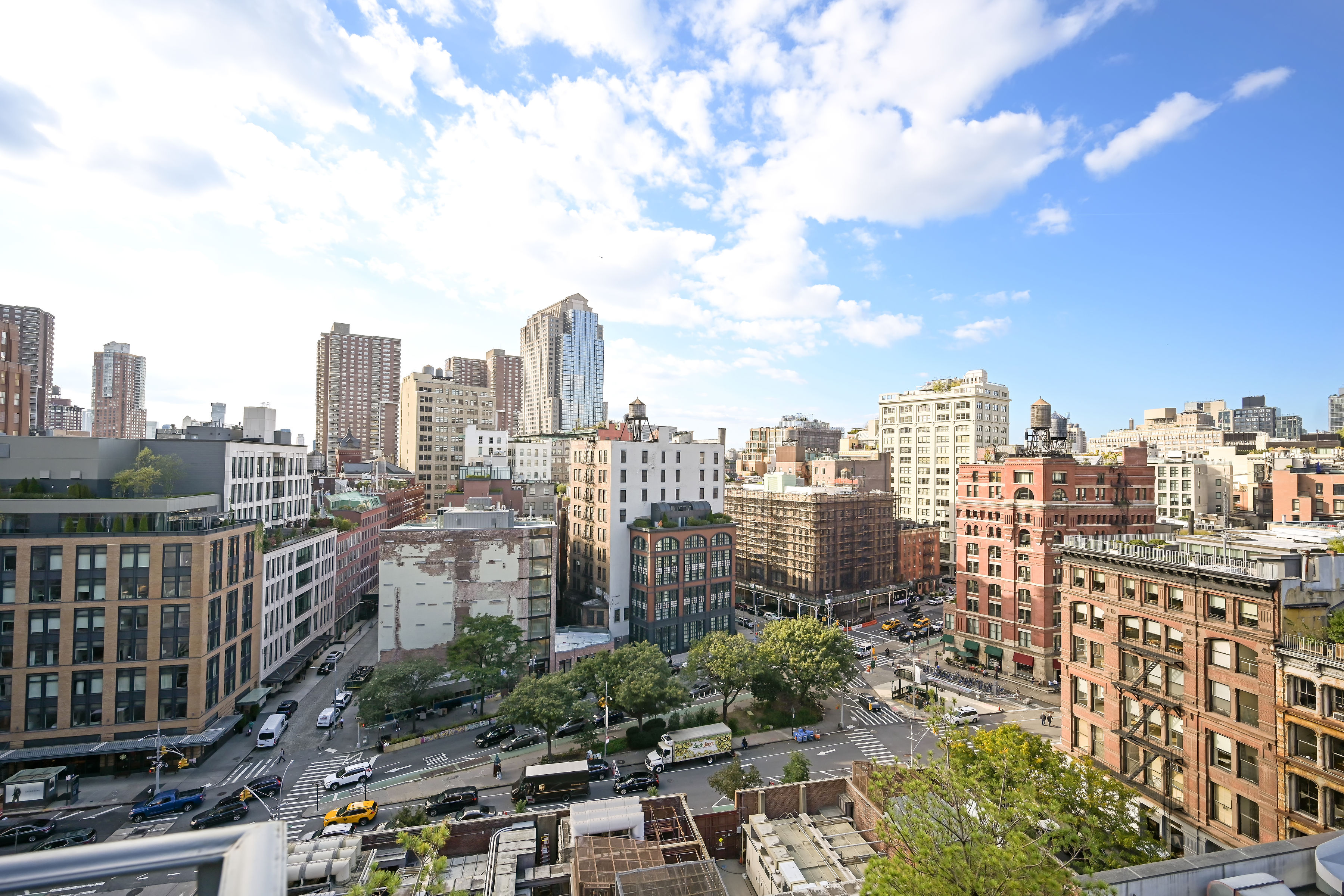 53 Leonard Street, Unit PH Manhattan, NY 10013 - Photo 21 of 24 a view of a city with tall buildings