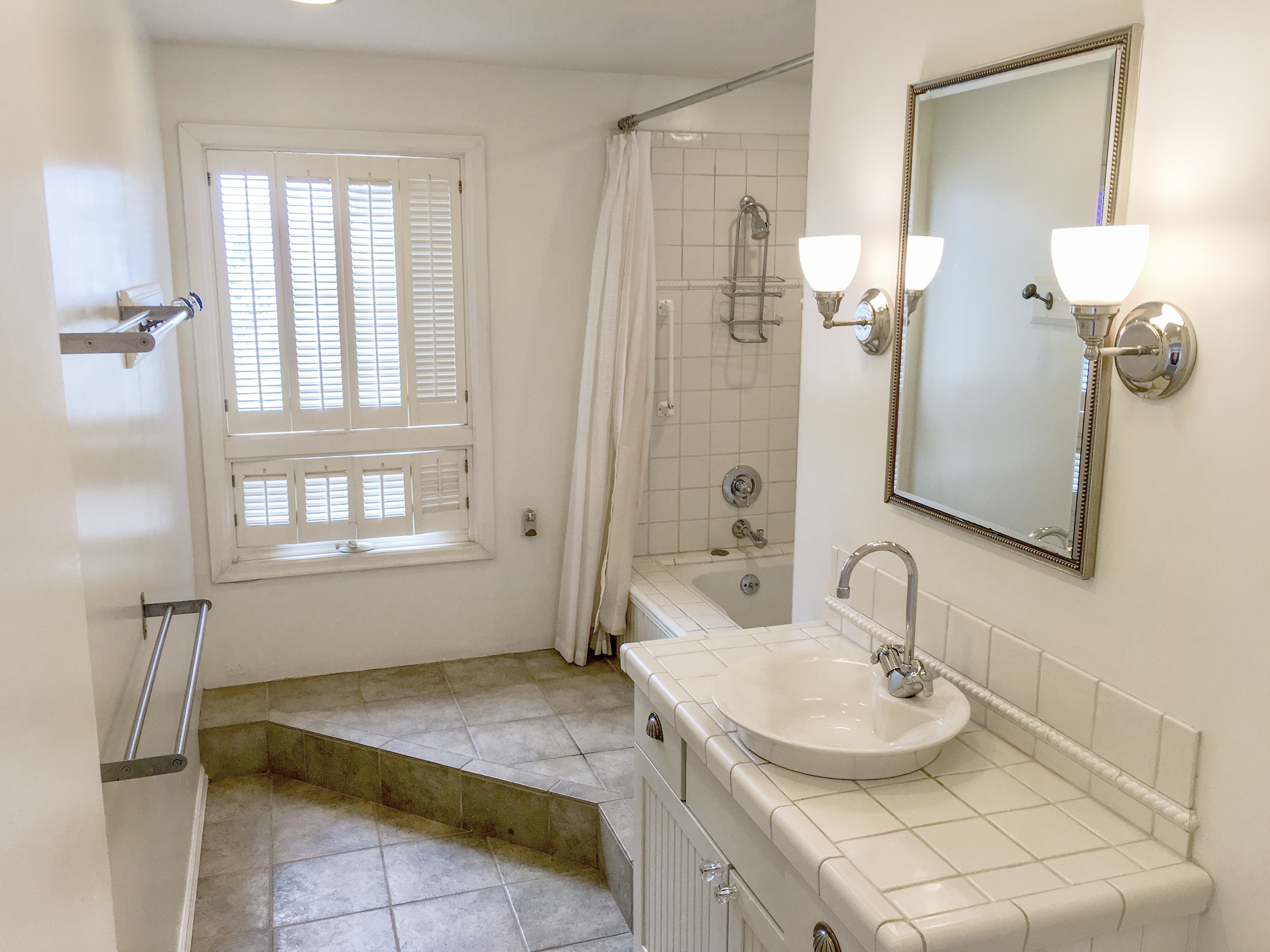 371 Inverness Drive Pacifica, CA 94044 - Photo 13 of 15 a bathroom with a sink and a mirror