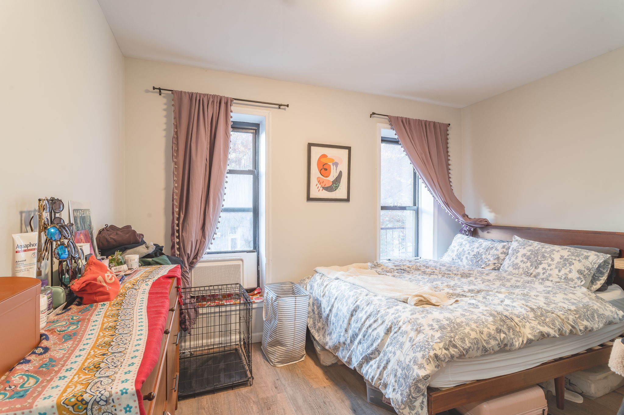 43 Underhill Avenue, Unit B2 Brooklyn, NY 11238 - Photo 6 of 10 a bedroom with a bed and large windows