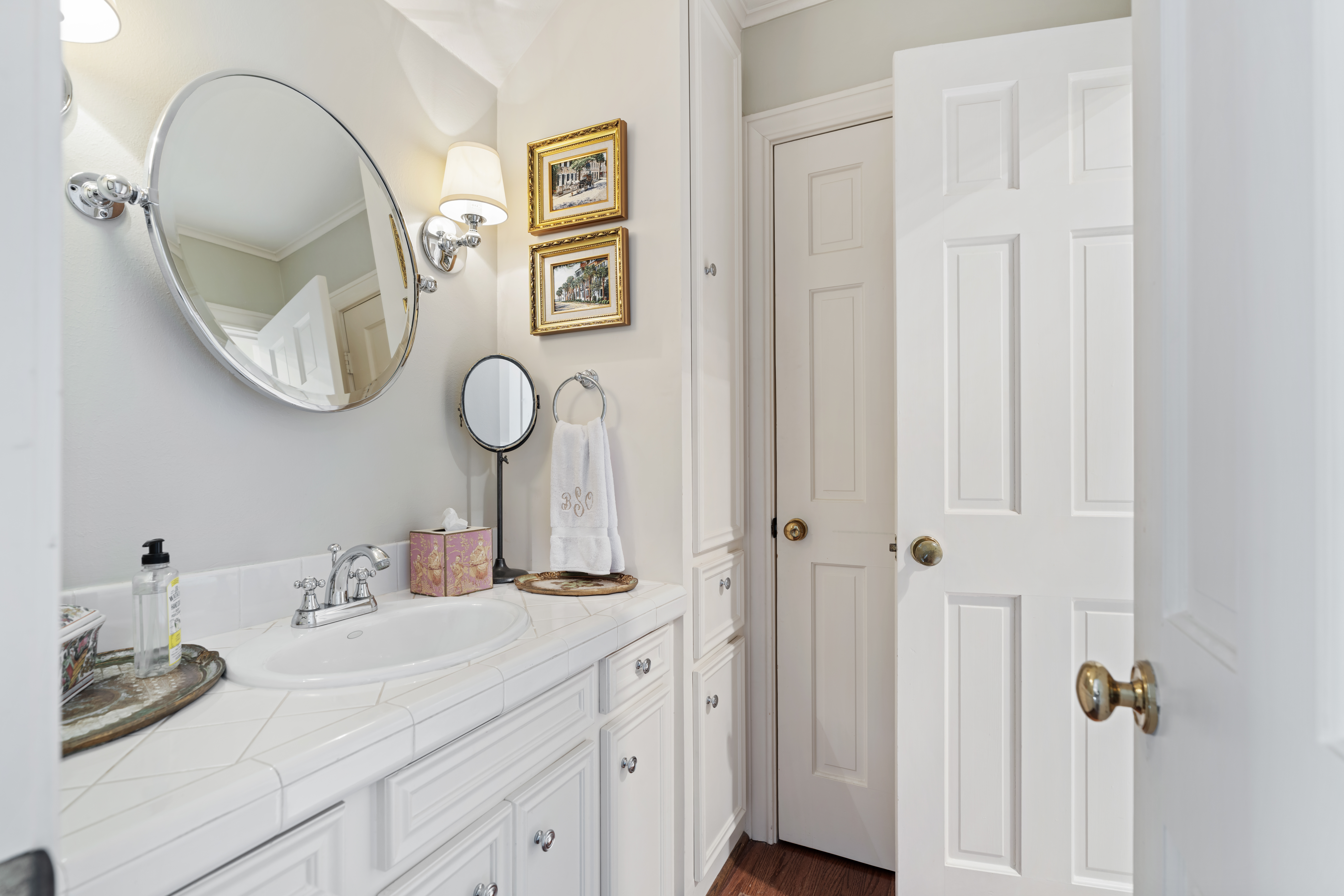 711 Pifer Road Houston, TX 77024 - Photo 35 of 53 a bathroom with a sink and a mirror