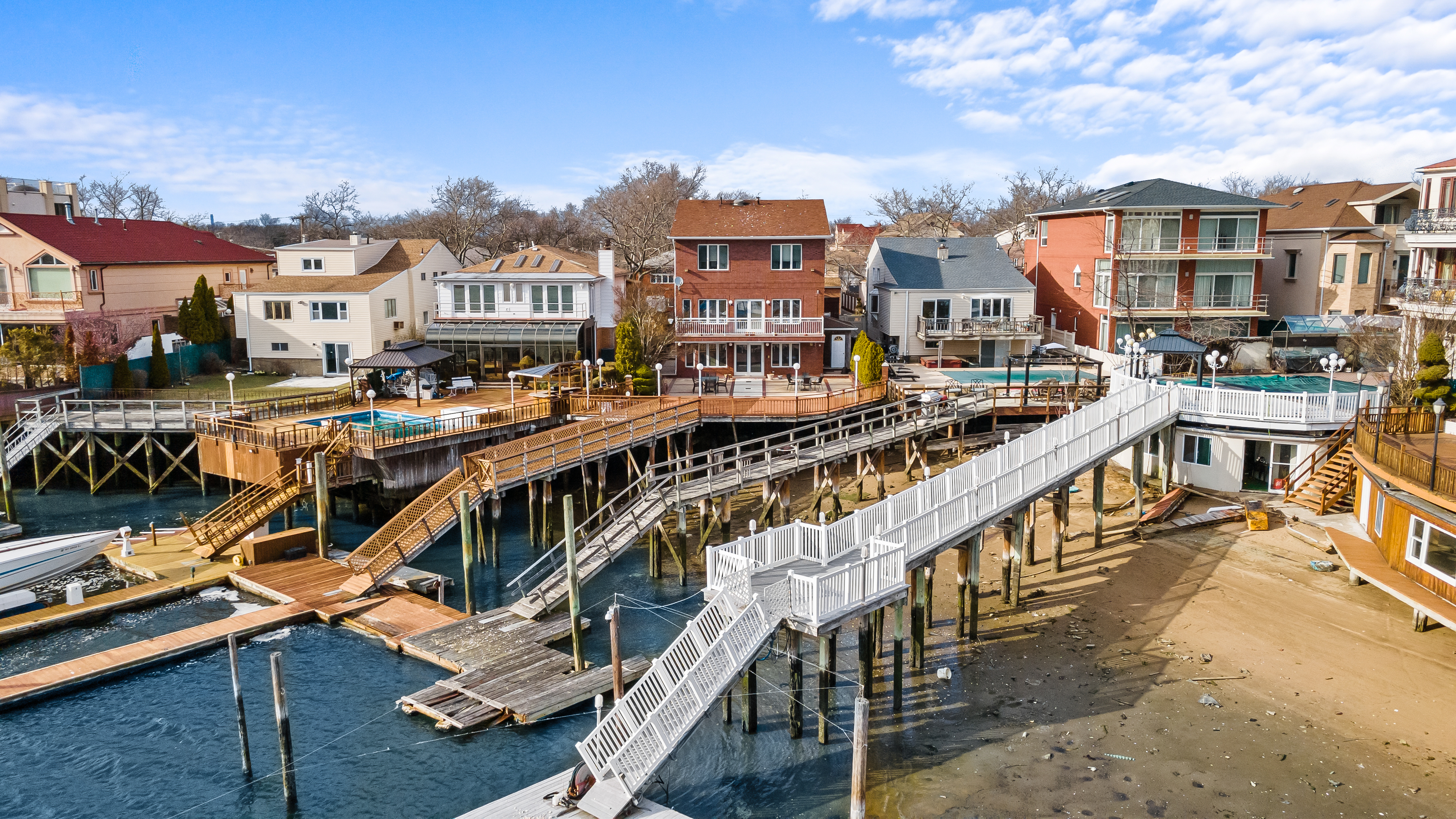 303 Whitman Drive Brooklyn, NY 11234 - Photo 33 of 37 a view of a city with tall buildings