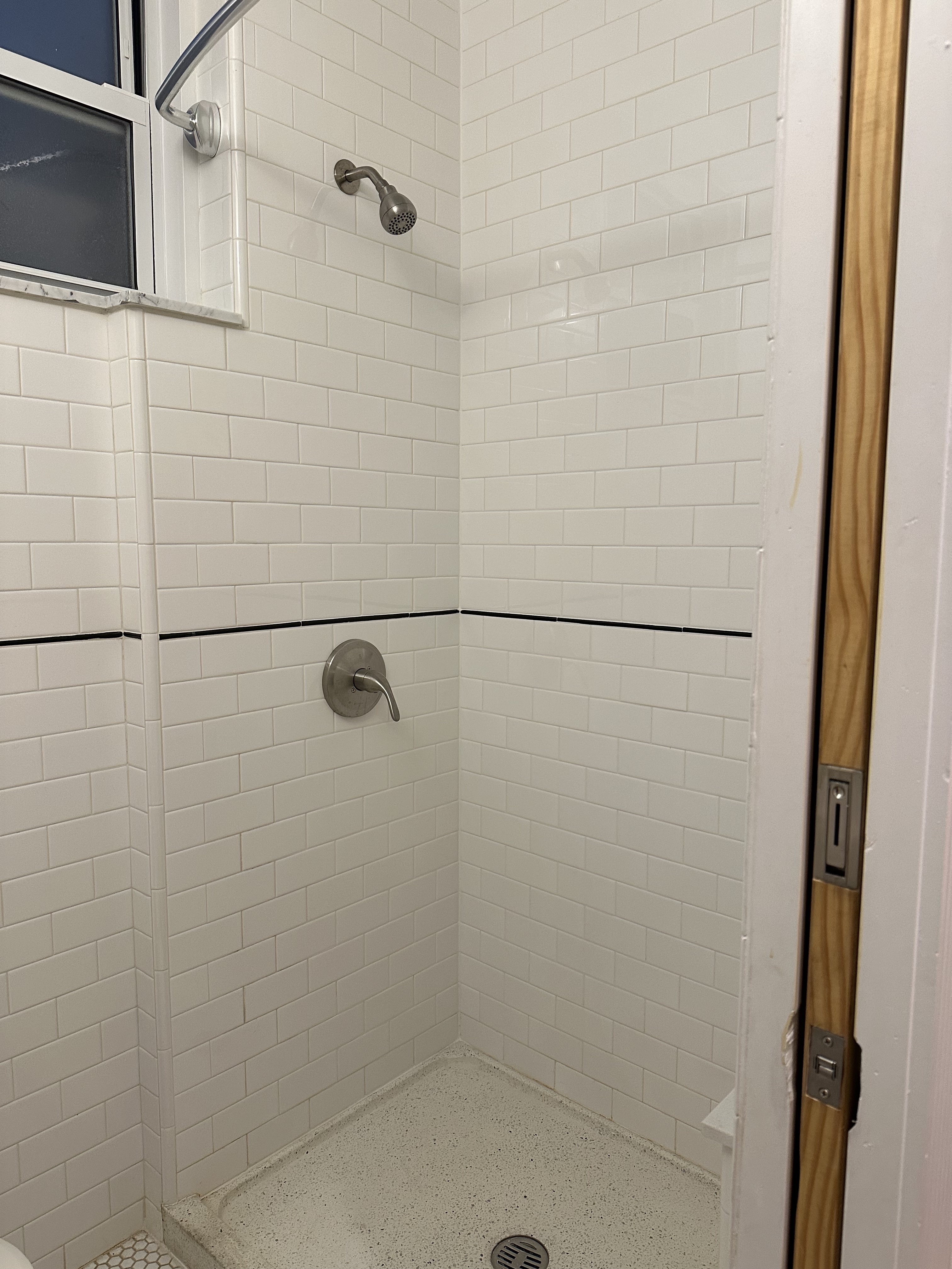 459 West 35th Street, Unit 1E Manhattan, NY 10001 - Photo 10 of 18 a bathroom with a shower
