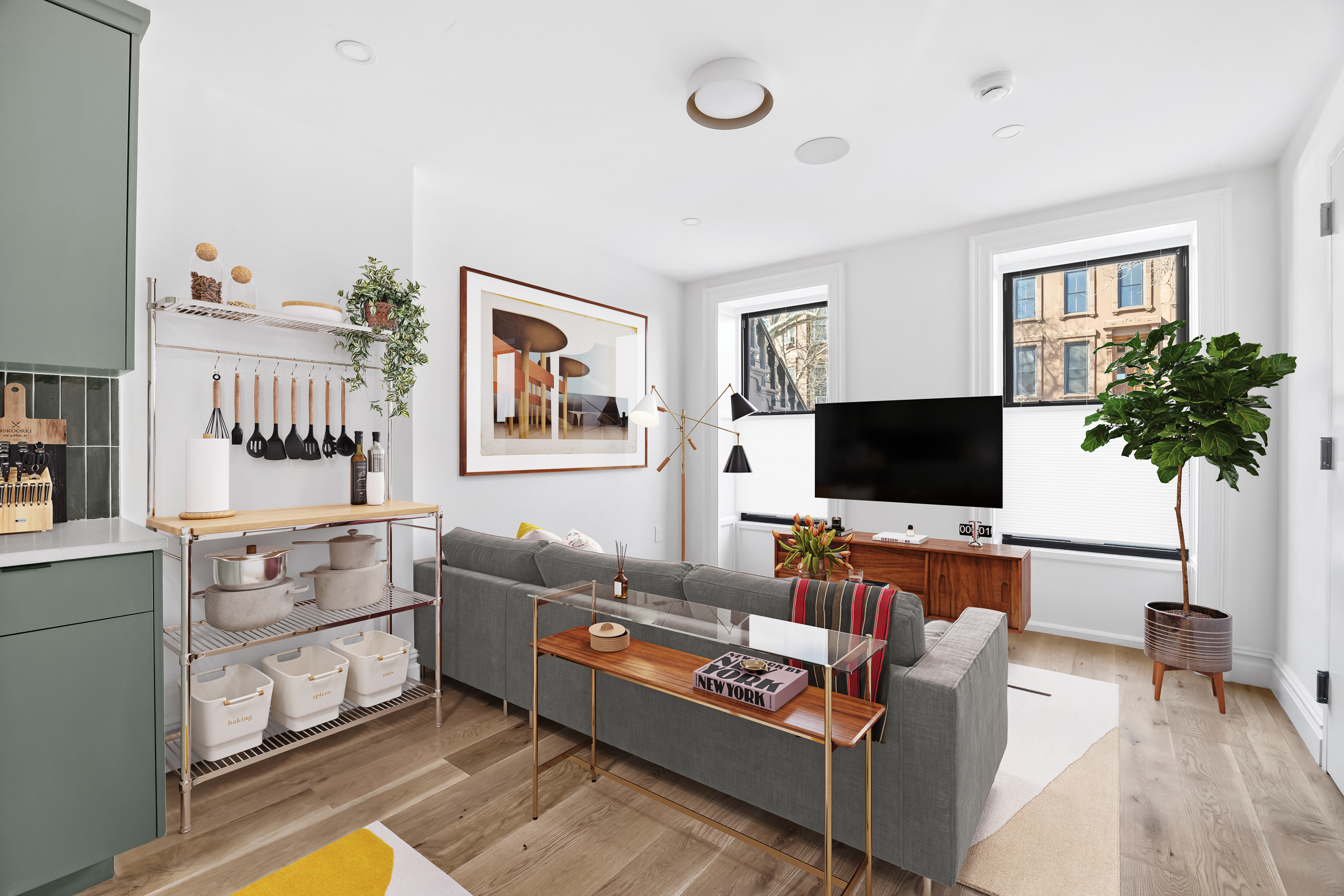 544 Madison Street, Unit A Brooklyn, NY 11221 - Photo 3 of 17 a living room with furniture and a flat screen tv