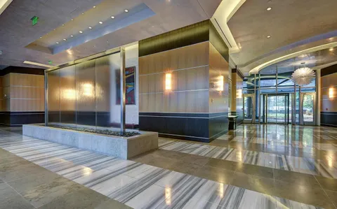 a lobby with gym equipment