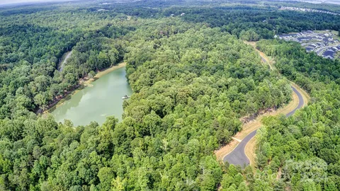 an aerial view of residential house with outdoor space
