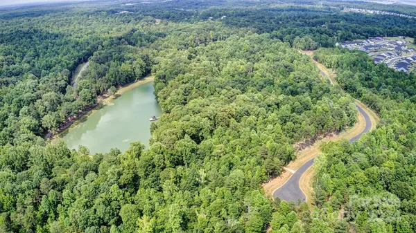 an aerial view of residential house with outdoor space
