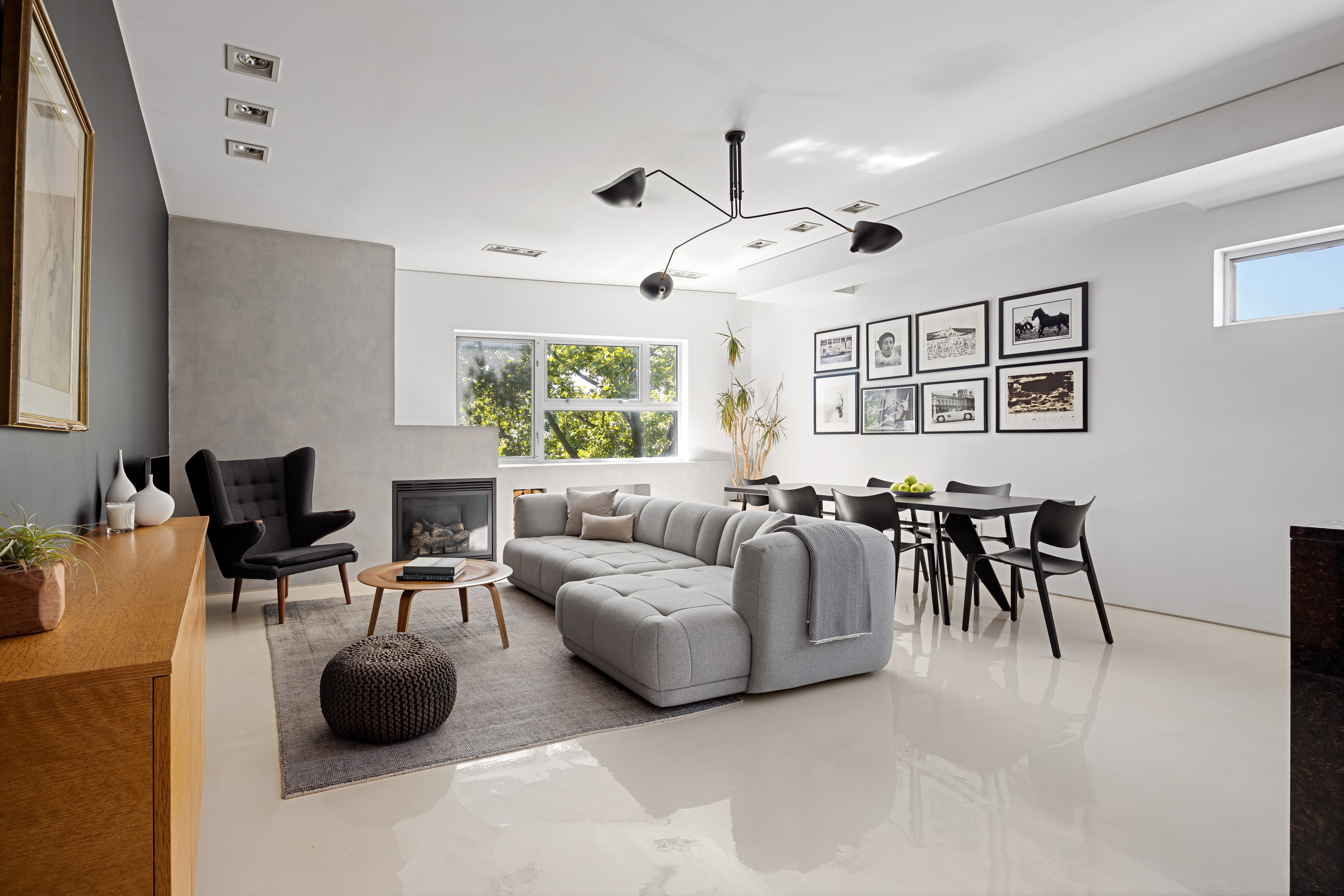 481 18th Street, Unit PH Brooklyn, NY 11215 - Photo 3 of 11 a living room with furniture and a large window