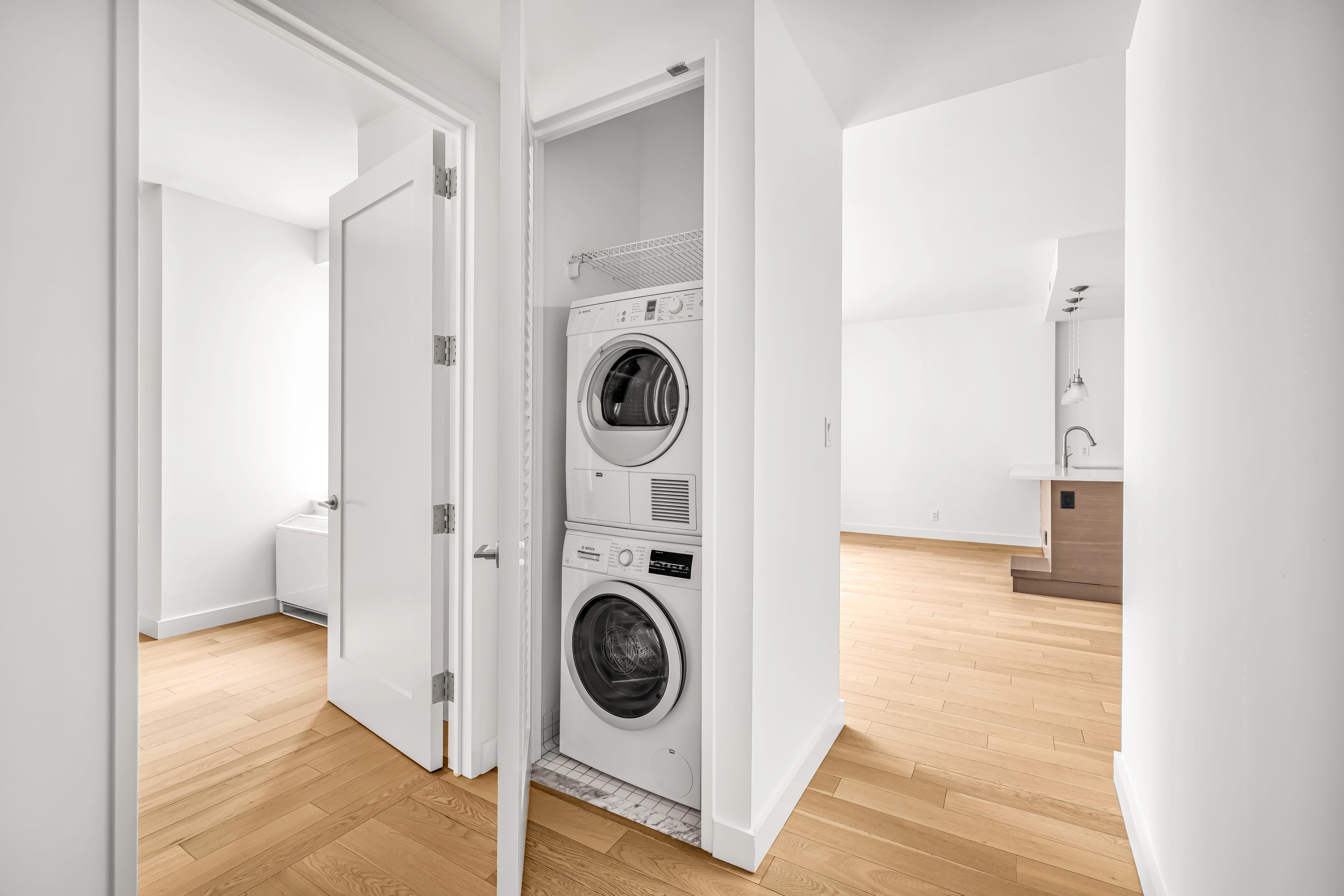 34 North 7th Street, Unit 3Z Brooklyn, NY 11249 - Photo 4 of 14 a view of washer and dryer in a utility room