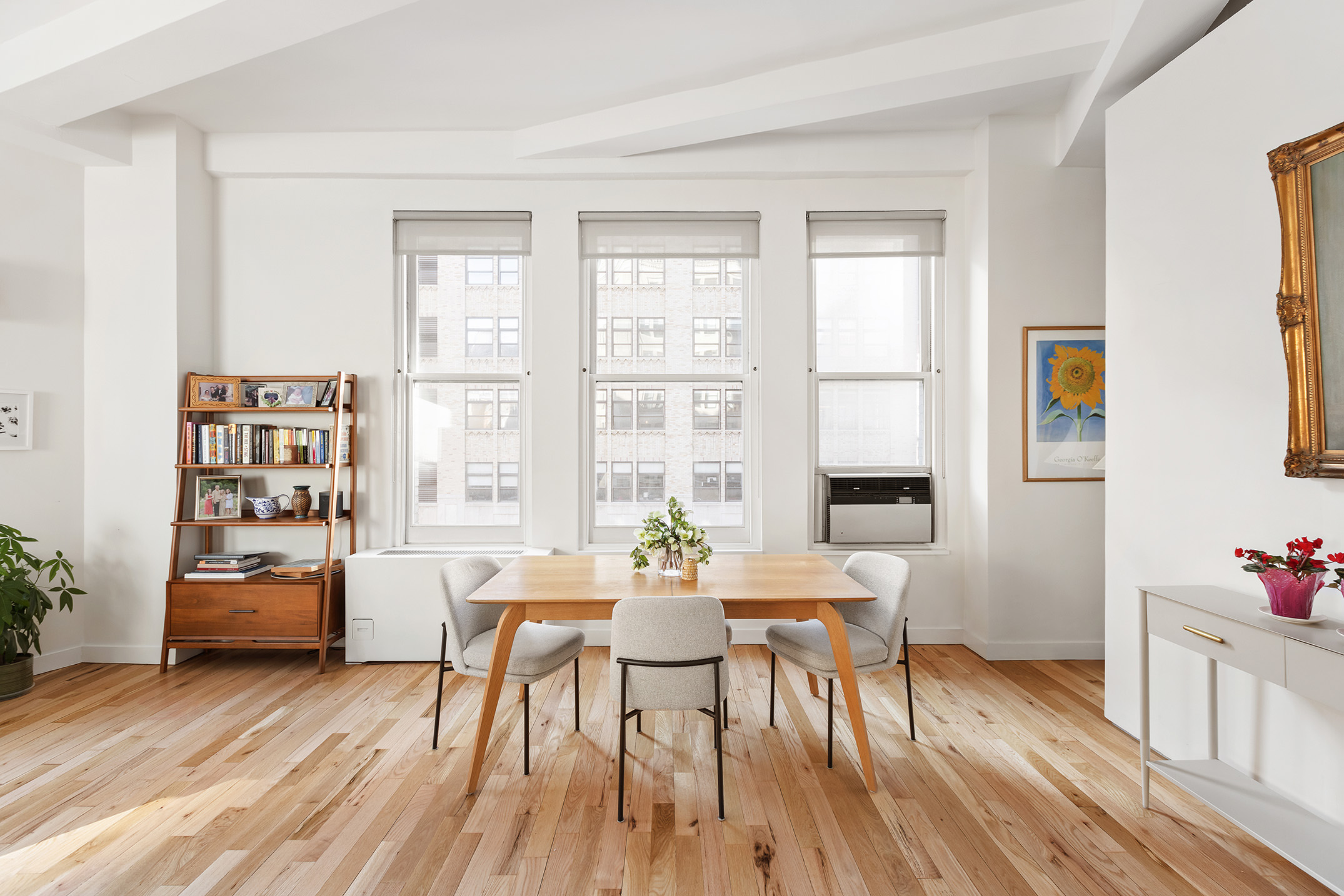 100 Hudson Street, Unit 4D Manhattan, NY 10013 - Photo 4 of 13 a dining room with furniture and wooden floor