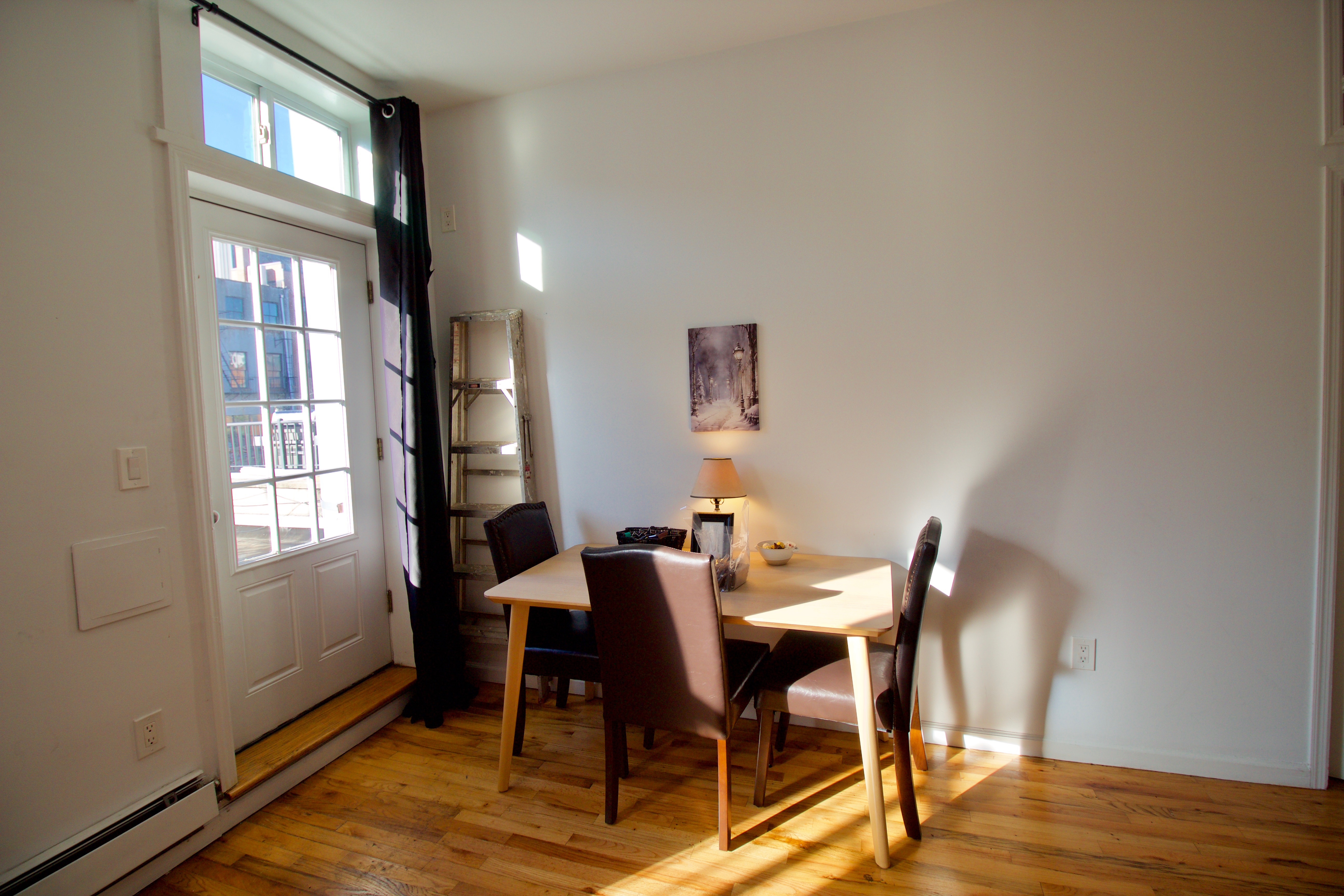 134 Union Street, Unit 2R Brooklyn, NY 11231 - Photo 28 of 37 a view of a dining room with furniture and wooden floor