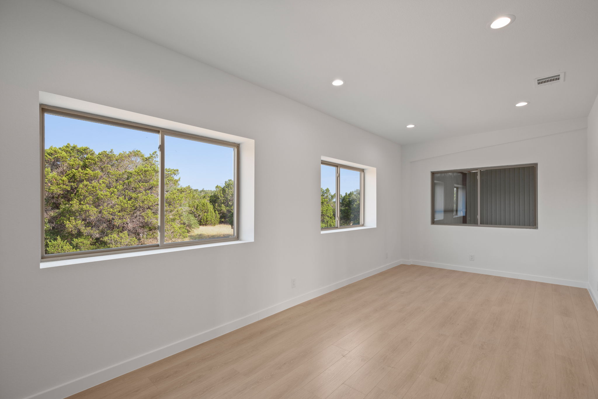 10020 Darden Hill Road, Unit 401 Austin, TX 78737 - Photo 28 of 50 a view of an empty room with a window