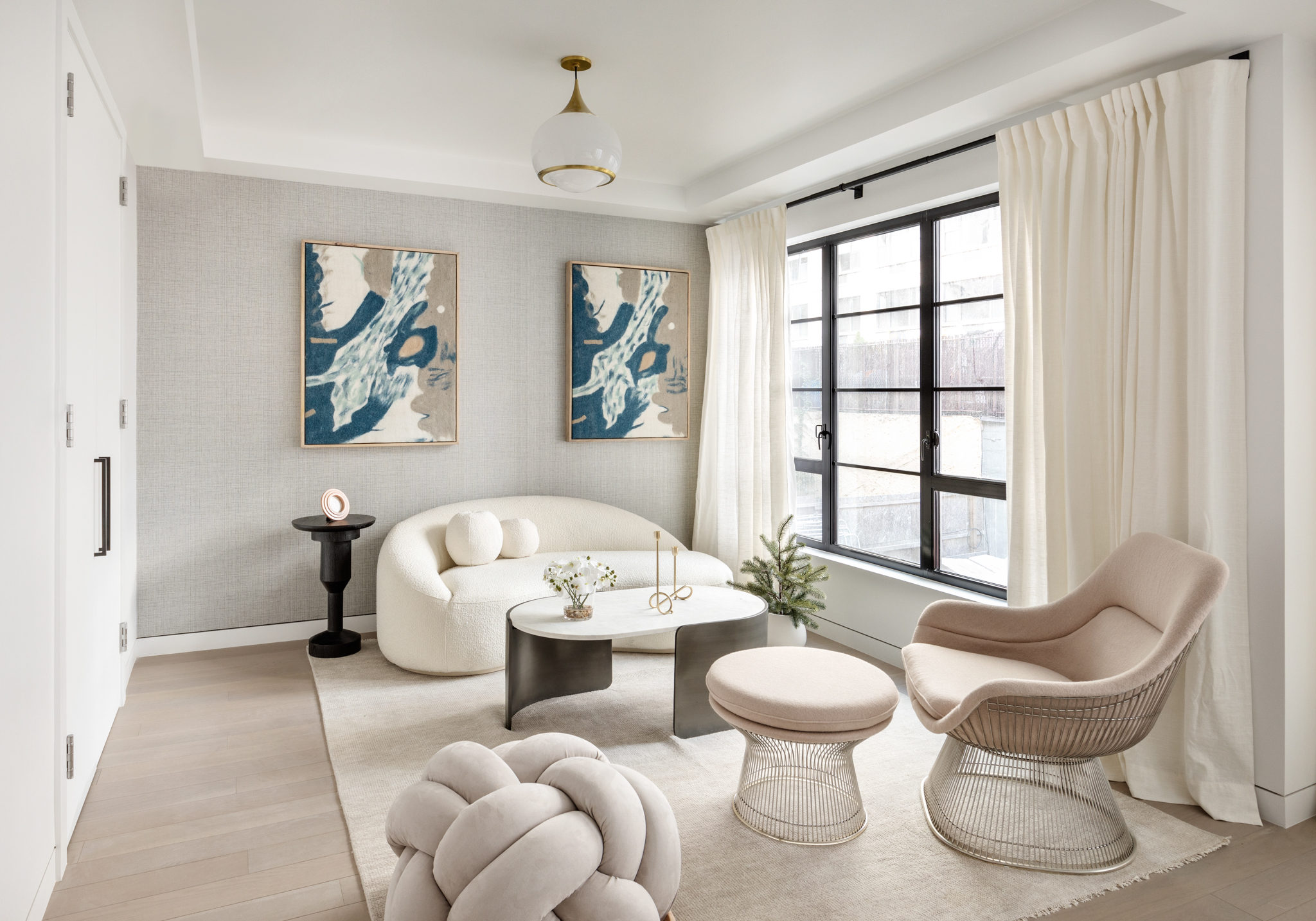 327 East 22nd Street, Unit 1A Manhattan, NY 10010 - Photo 8 of 11 a living room with furniture and a large window