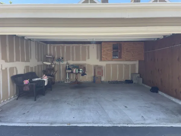 a view of a swimming pool with outdoor seating