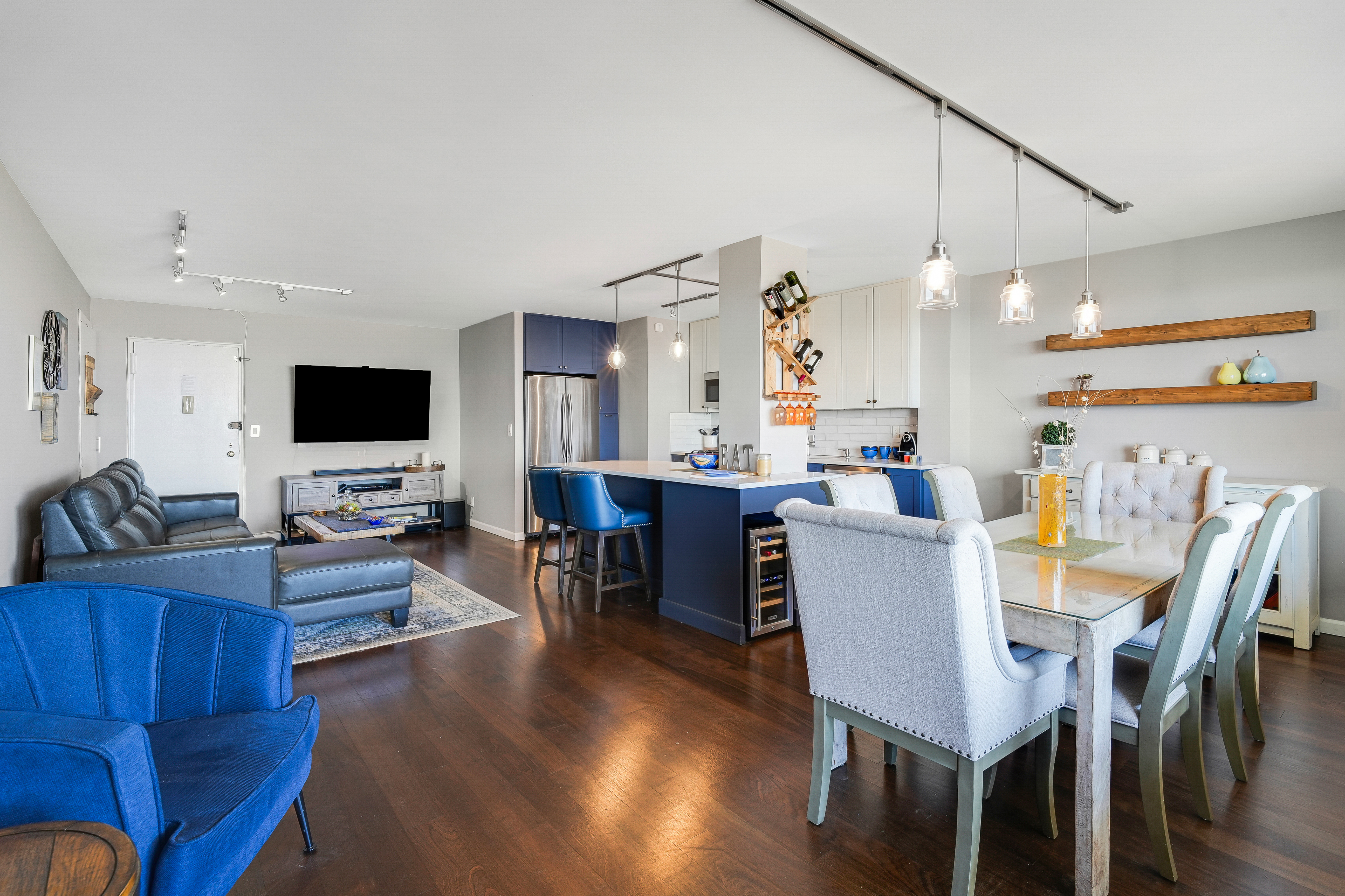 5900 Arlington Avenue, Unit 17W Bronx, NY 10471 - Photo 5 of 14 a view of a dining room with furniture wooden floor and chandelier