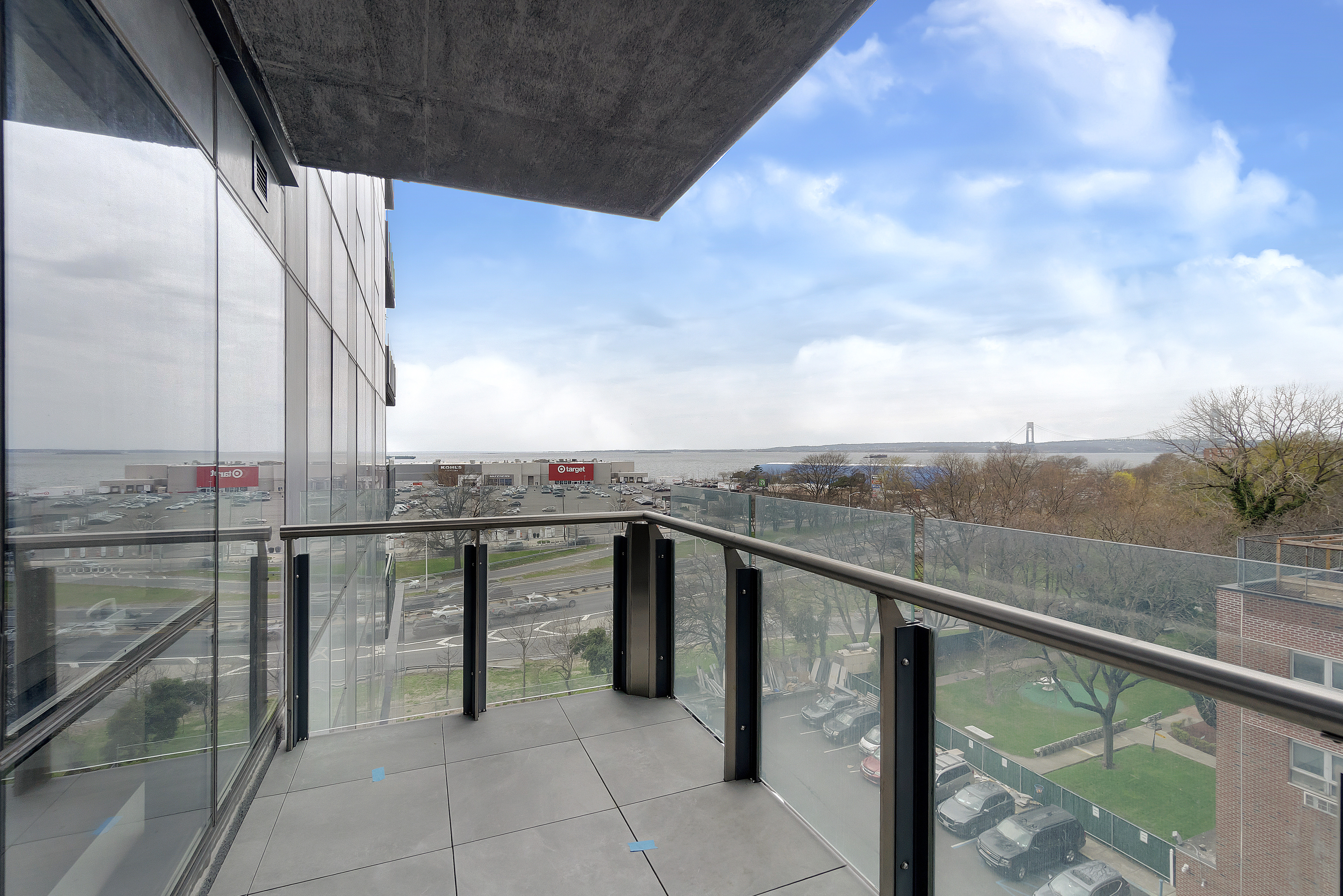 2286 Cropsey Avenue, Unit 6G Brooklyn, NY 11214 - Photo 9 of 22 a view of a balcony with chairs and city view