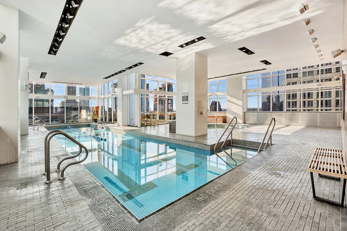 350 West 42nd Street, Unit 12C Manhattan, NY 10036 - Photo 10 of 21 a living room with furniture