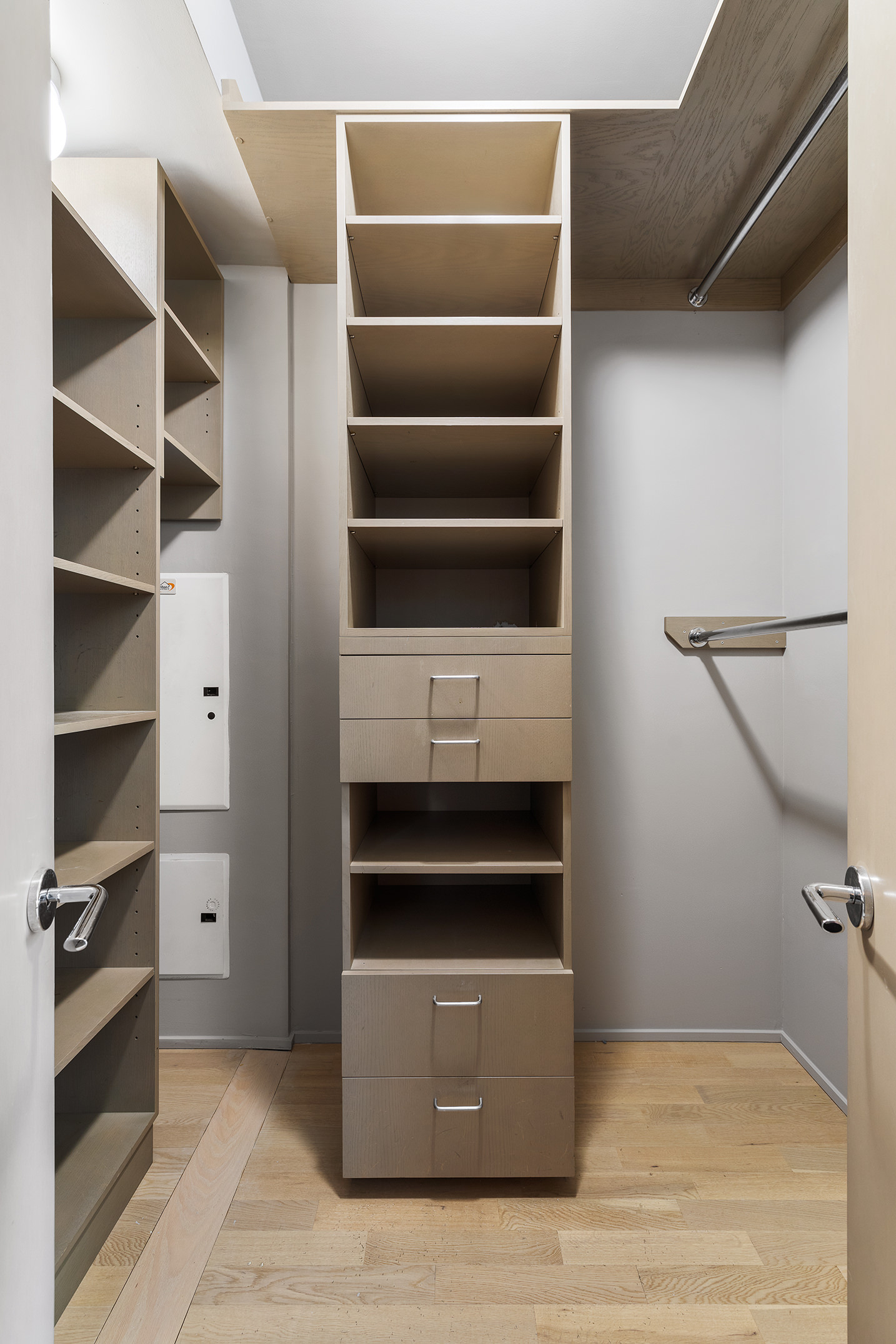 110 3rd Avenue, Unit 4C Manhattan, NY 10003 - Photo 8 of 17 a view of an empty room with empty shelves