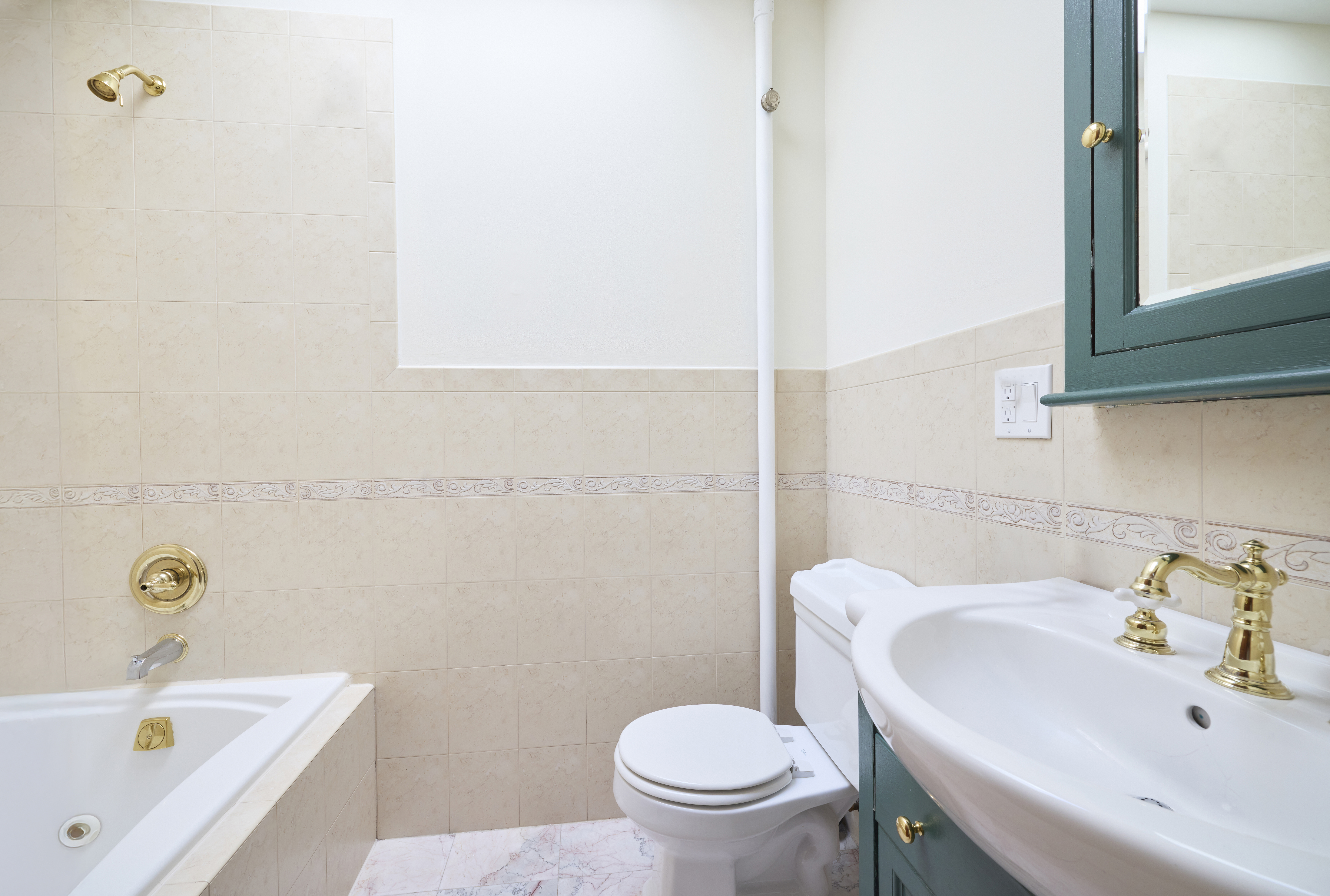 1702 8th Avenue, Unit 3 Brooklyn, NY 11215 - Photo 9 of 15 a bathroom with a sink a toilet and bathtub