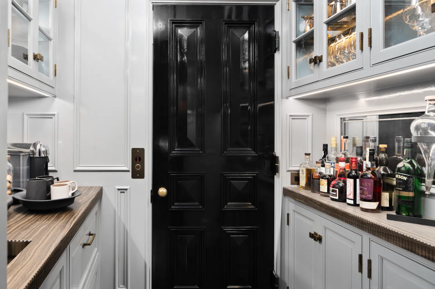 a kitchen with lots of counter top space and cabinets