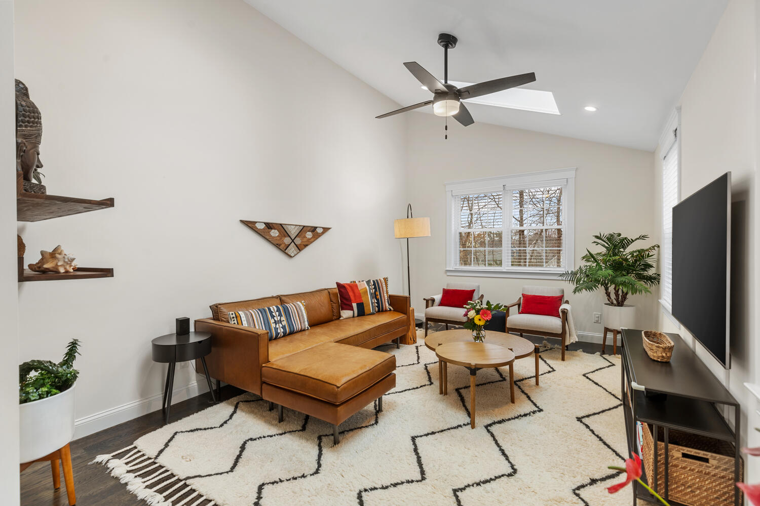 1 Maple Street, Unit 1 Maynard, MA 01754 - Photo 16 of 42 a living room with furniture and a flat screen tv