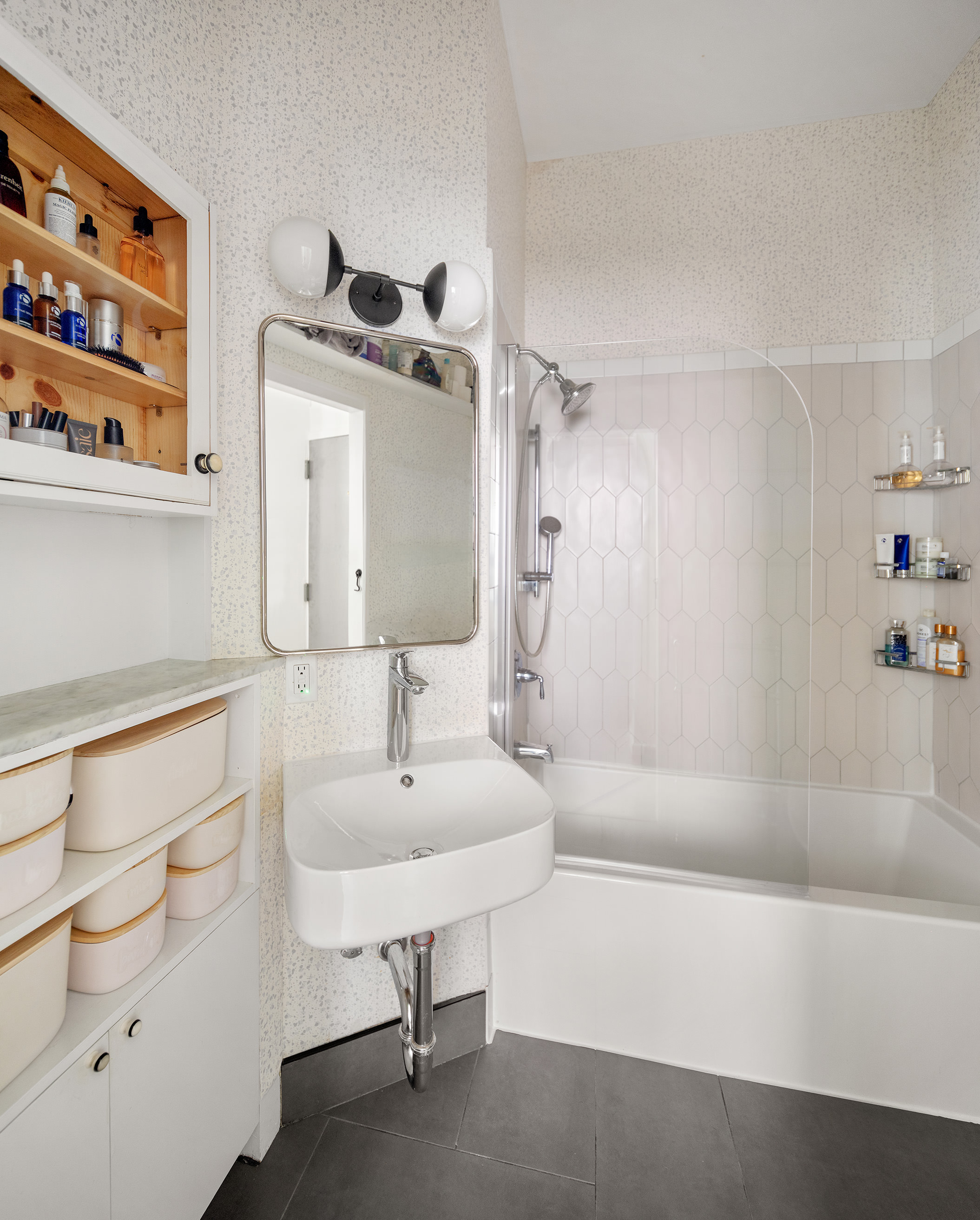 71 East 3rd Street, Unit 4 Manhattan, NY 10003 - Photo 9 of 18 a bathroom with a sink a toilet and shower