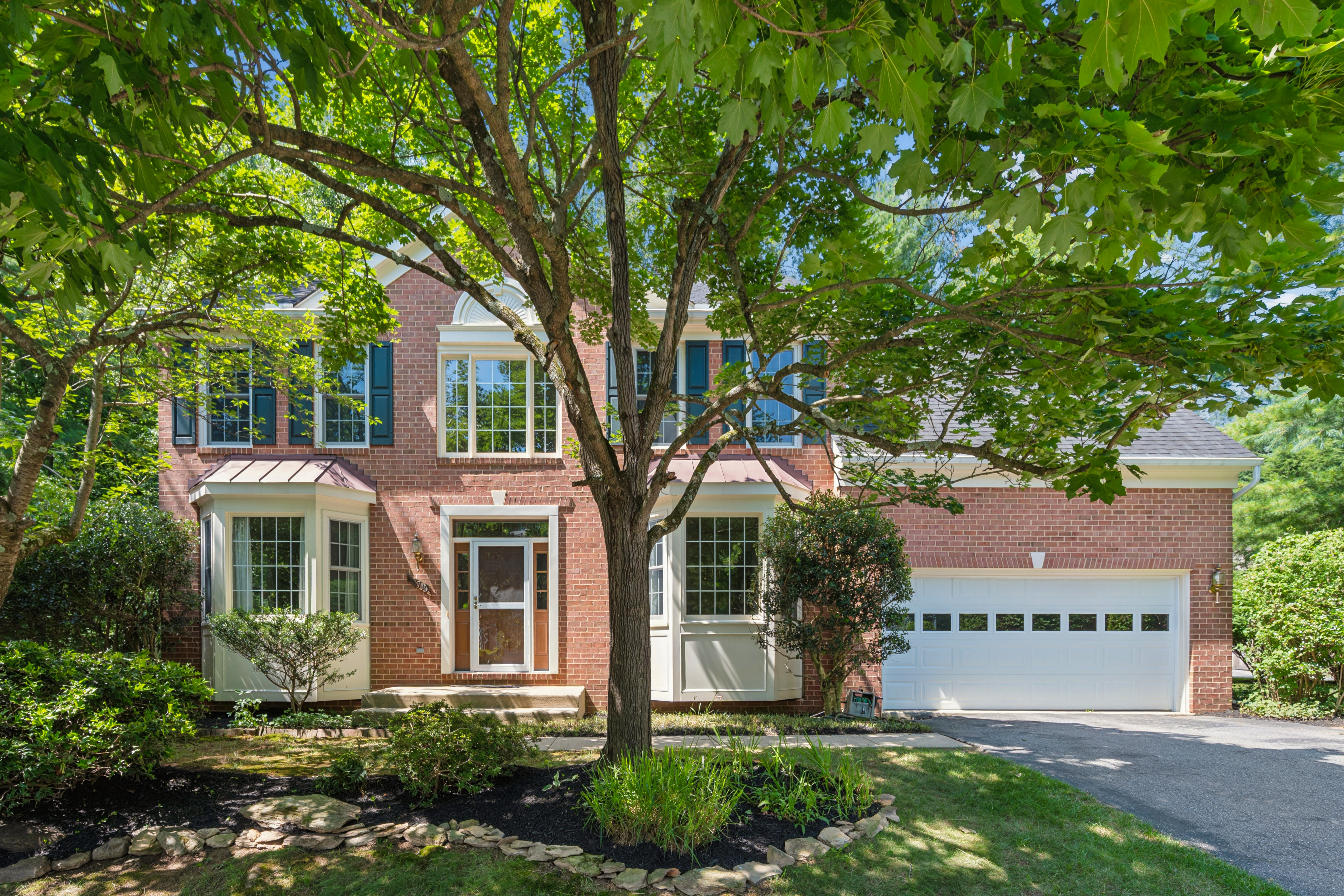 18710 Severn Road Gaithersburg, MD 20879 - Photo 1 of 96 a front view of a house with garden
