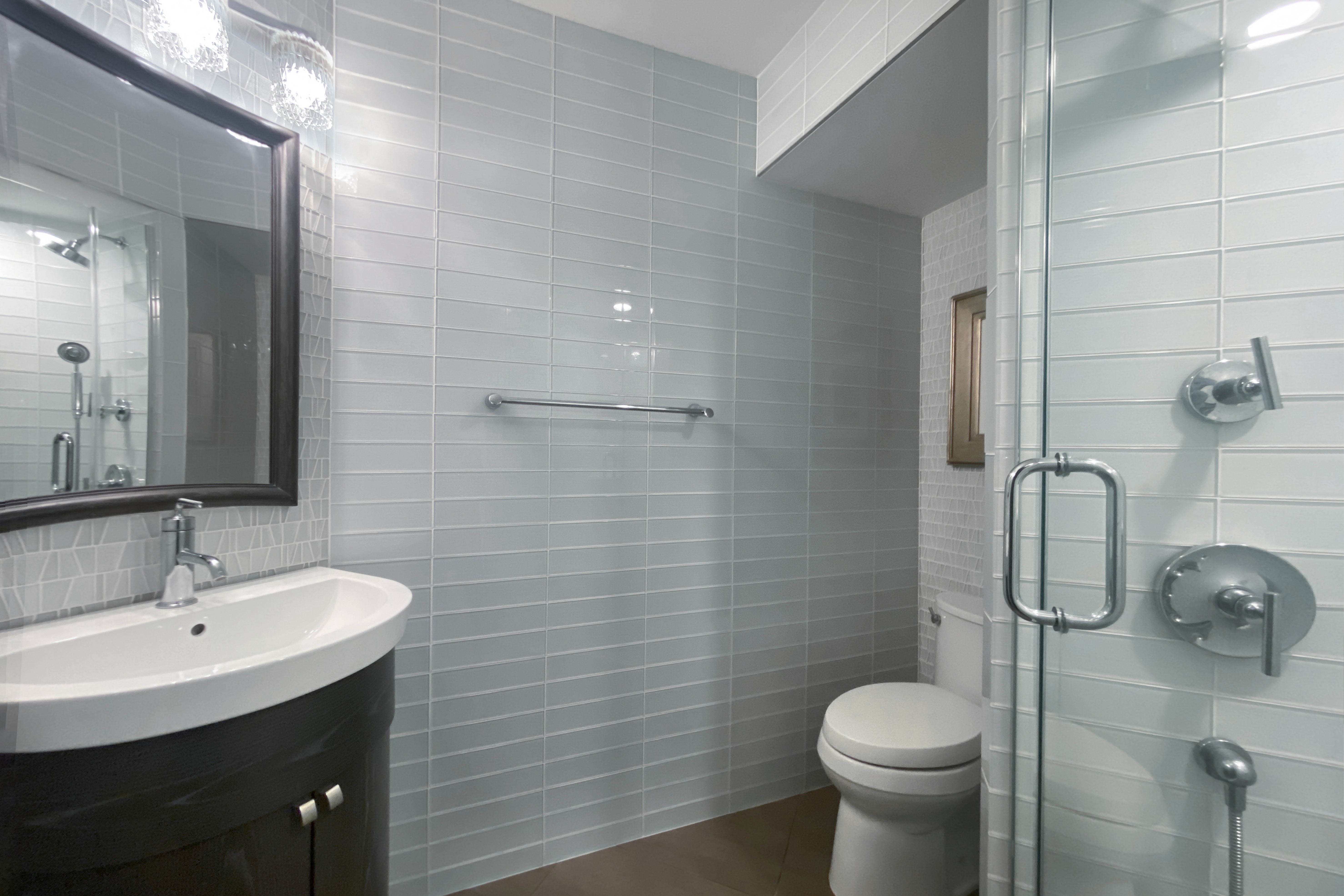 330 East 38th Street, Unit 38E Manhattan, NY 10016 - Photo 15 of 35 a bathroom with a sink toilet and shower