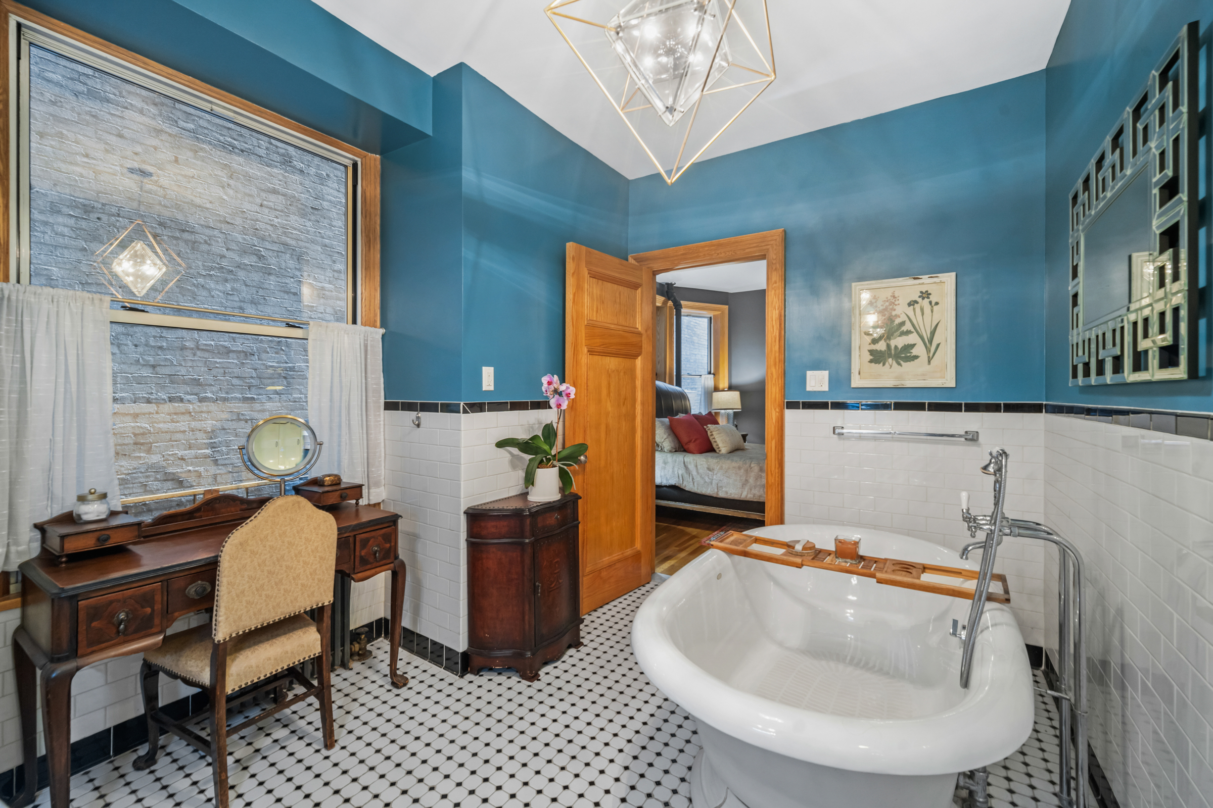 300 West 109th Street, Unit 2JK Manhattan, NY 10025 - Photo 13 of 18 a bathroom with a sink and a mirror