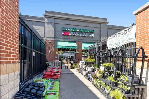 a grocery store filled with lots of fruit and vegetables