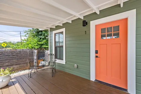 a backyard of a house with seating space