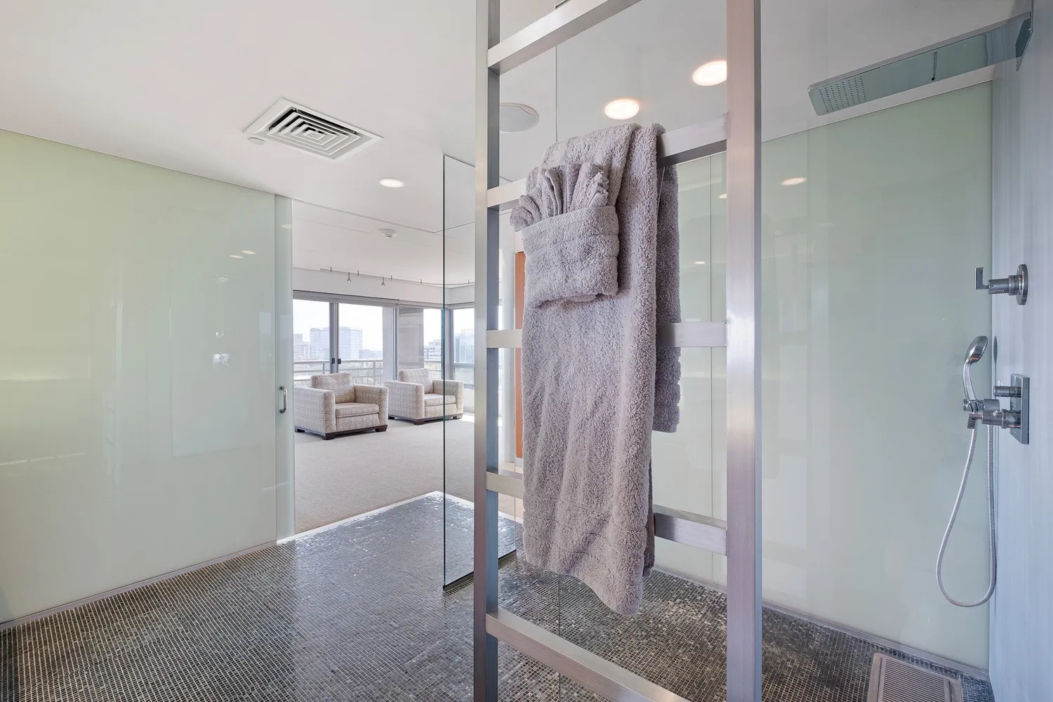 a view of a livingroom with furniture and a chandelier