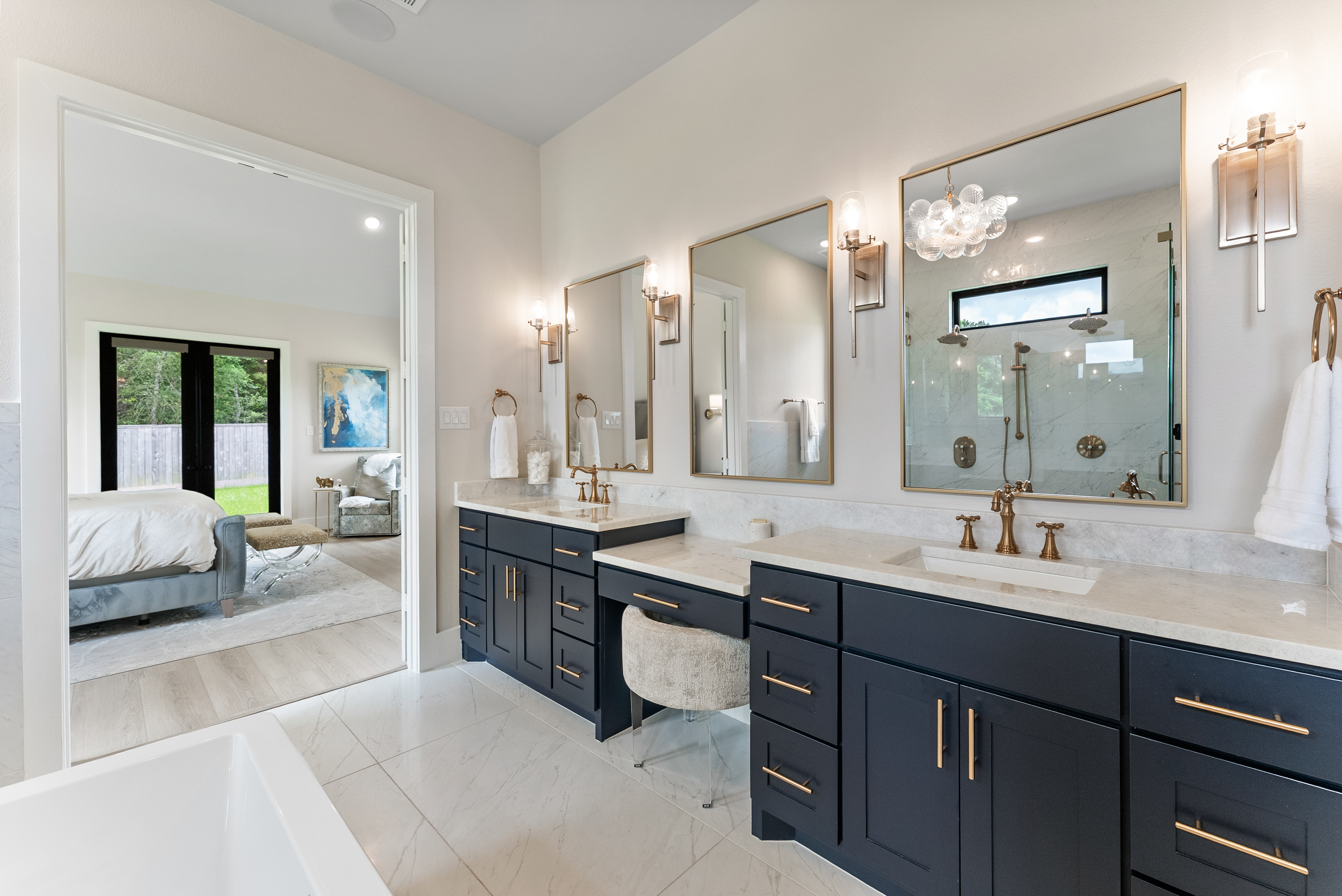 2118 Bennet Court Conroe, TX 77384 - Photo 31 of 70 a spacious en suite bathroom with a sink double vanity and a mirror