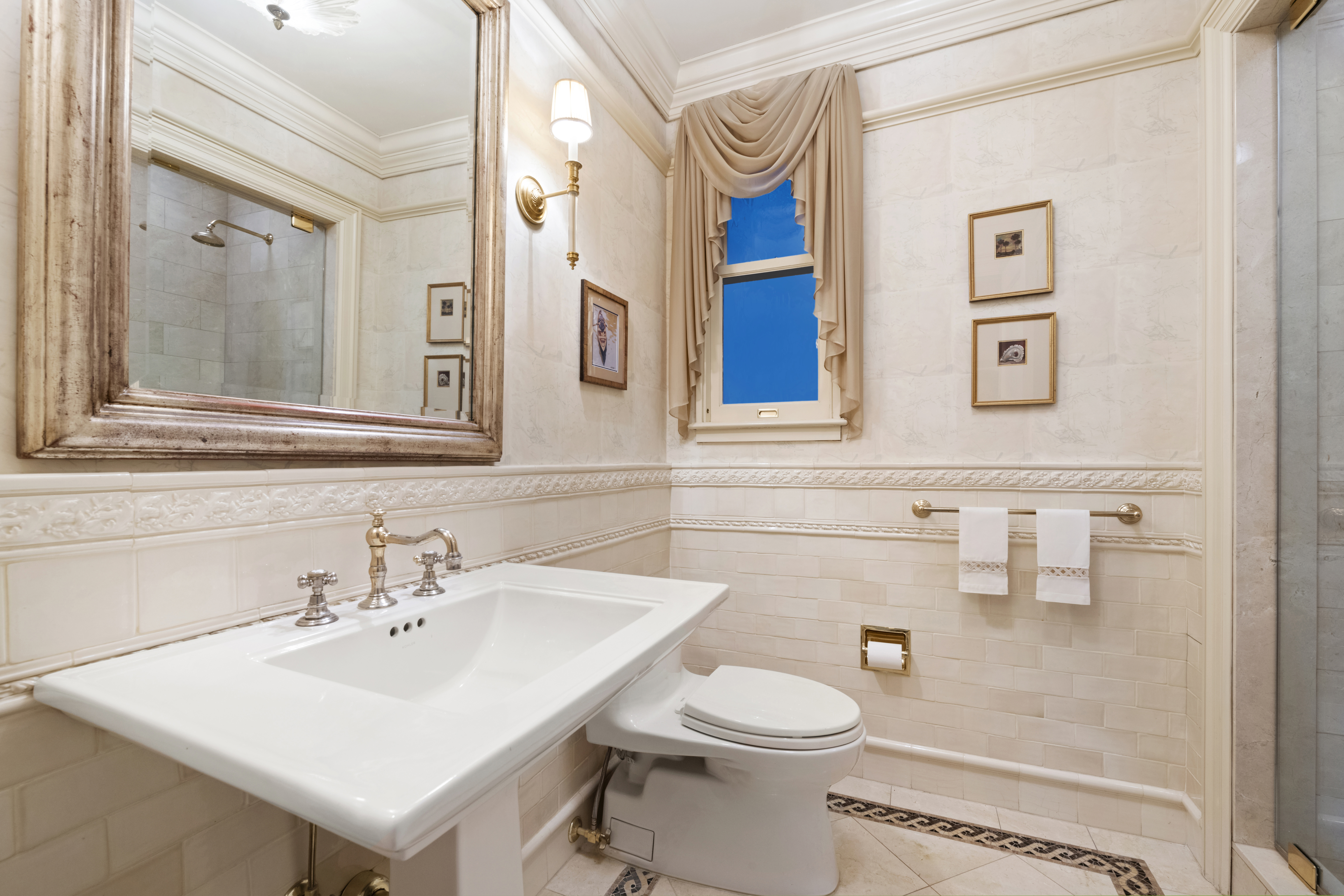 151 Central Park West, Unit 11NORTH Manhattan, NY 10023 - Photo 7 of 19 a bathroom with a sink toilet and mirror