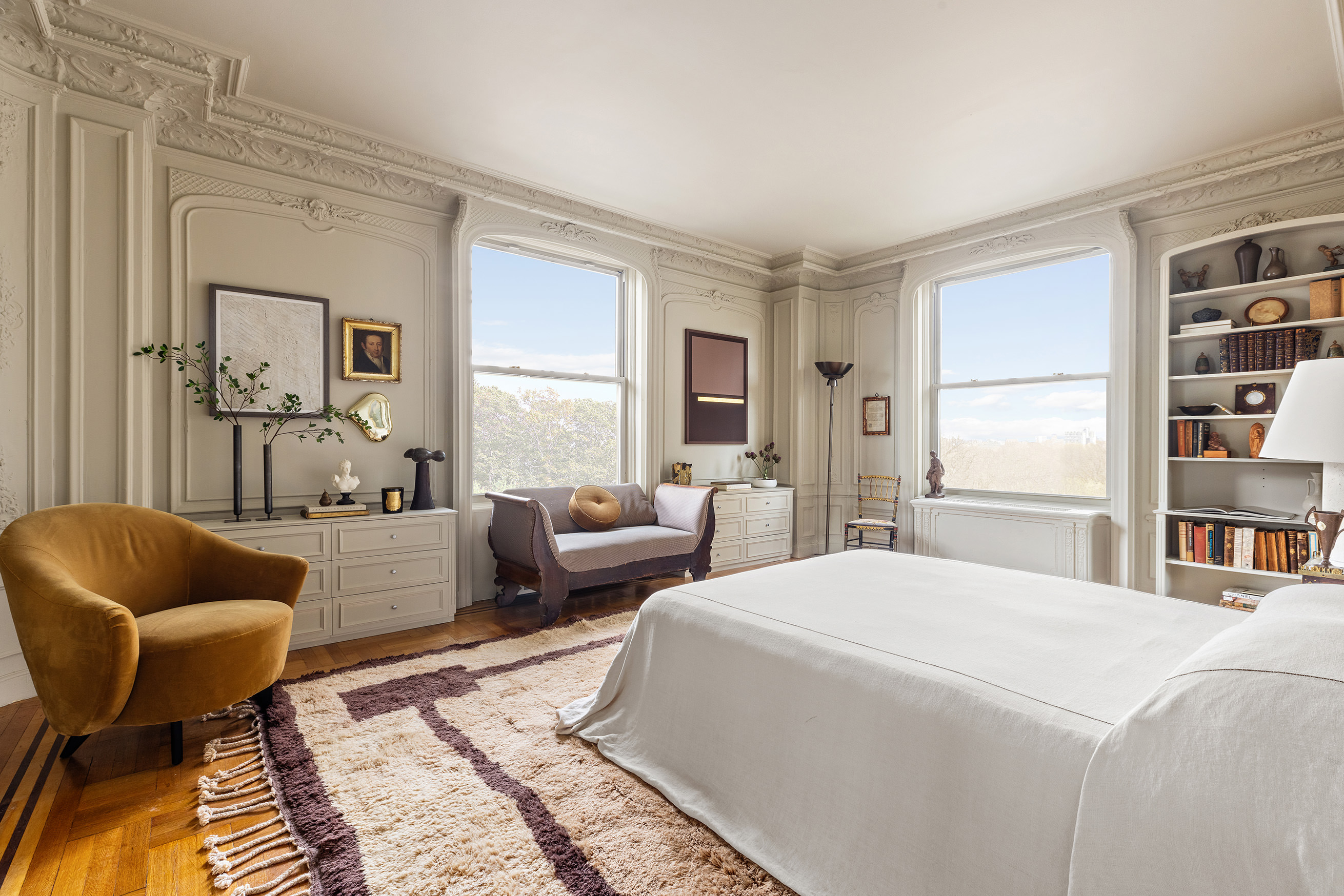 1136 5th Avenue, Unit 6A Manhattan, NY 10128 - Photo 29 of 44 a bedroom with furniture and a couch