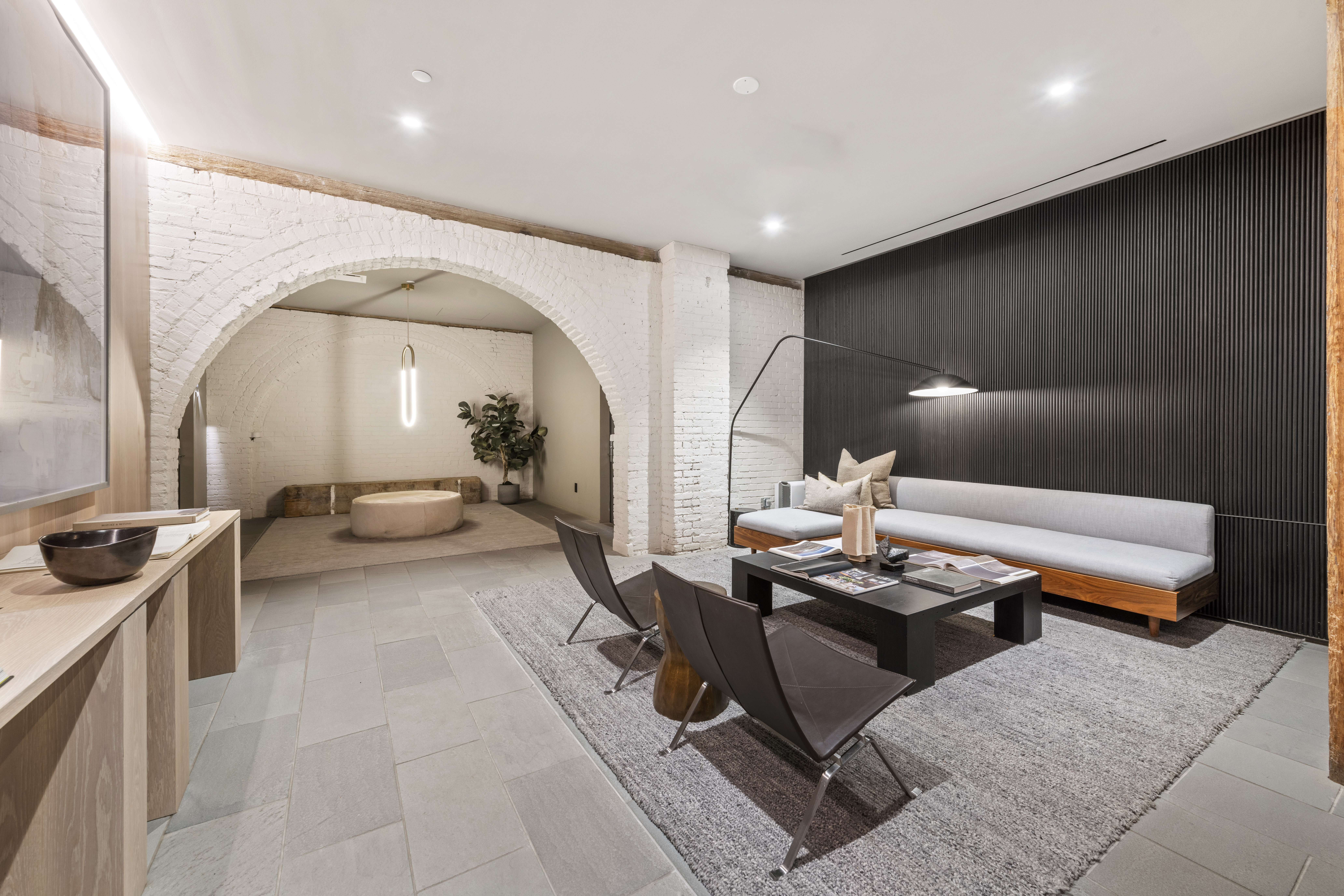 168 Plymouth Street, Unit 5A Brooklyn, NY 11201 - Photo 17 of 19 a living room with furniture and a wooden floor