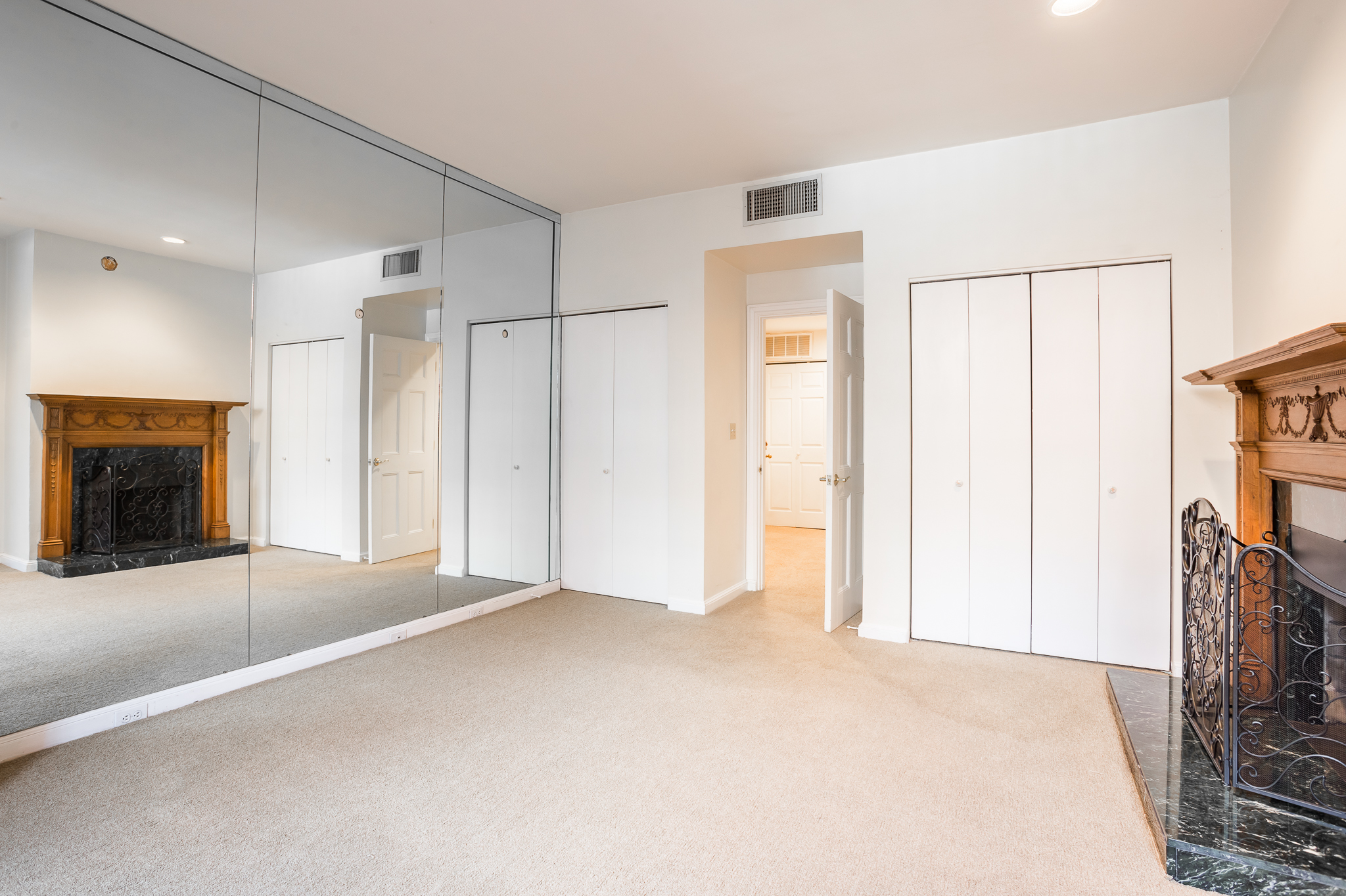 327 Commonwealth Avenue Boston, MA 02115 - Photo 6 of 26 a view of empty room with fireplace and shower