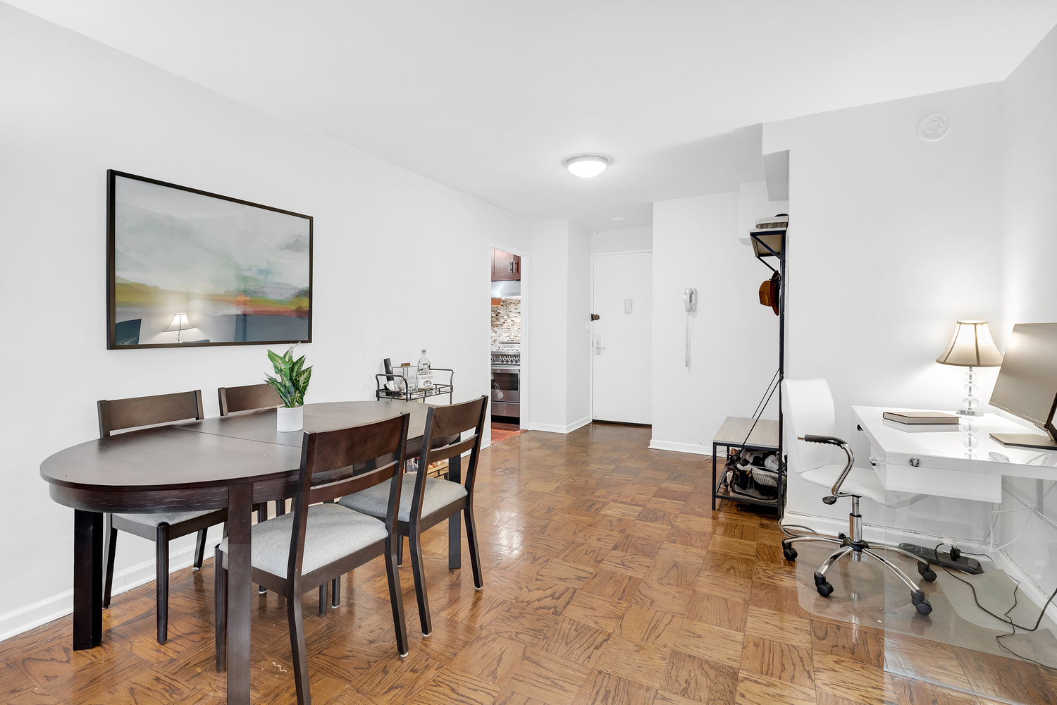 16 West 16th Street, Unit 2LN Manhattan, NY 10011 - Photo 2 of 11 a living room with furniture and a flat screen tv