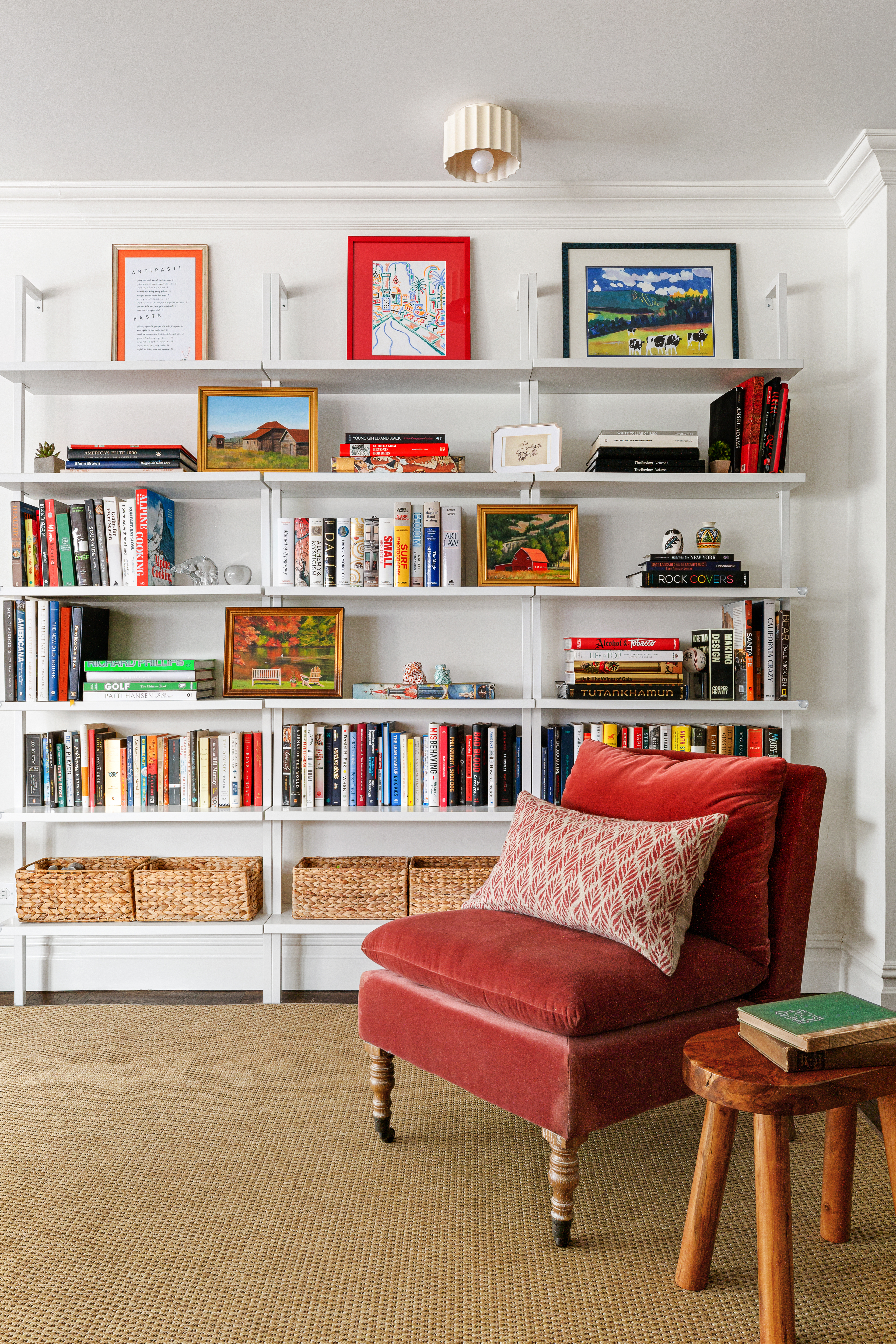 174 East 74th Street, Unit 3A Manhattan, NY 10021 - Photo 2 of 11 a reading room with furniture book shelf and book shelf