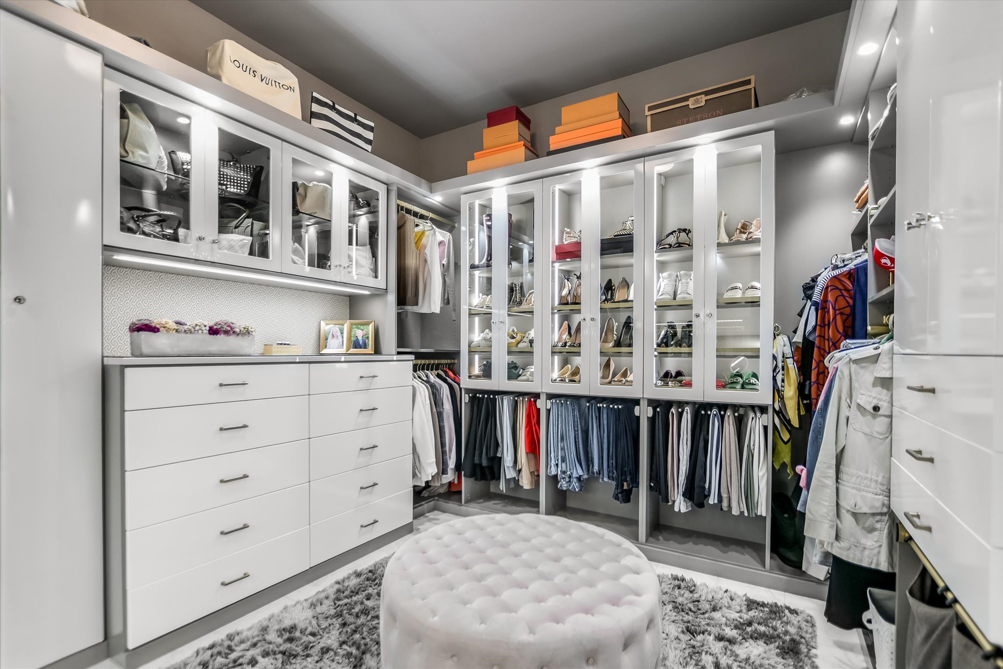 1422 Palomino Ridge Drive Austin, TX 78733 - Photo 21 of 60 a view of walk in closet with clothes and shoes