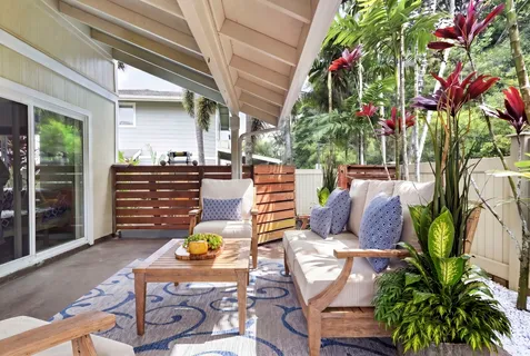 a view of a chairs and table in a patio